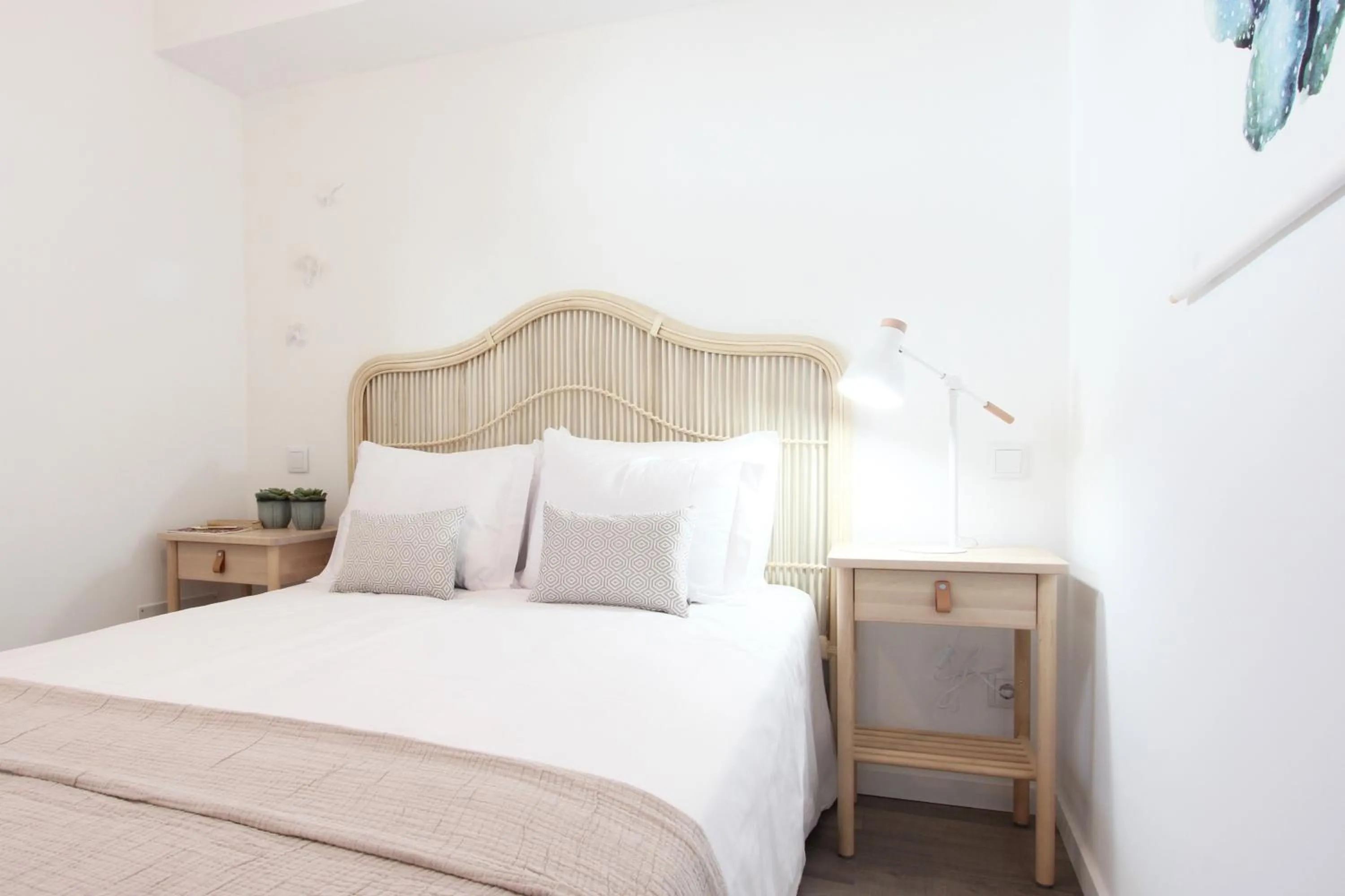 Bed in Lavradores Boutique Guesthouse