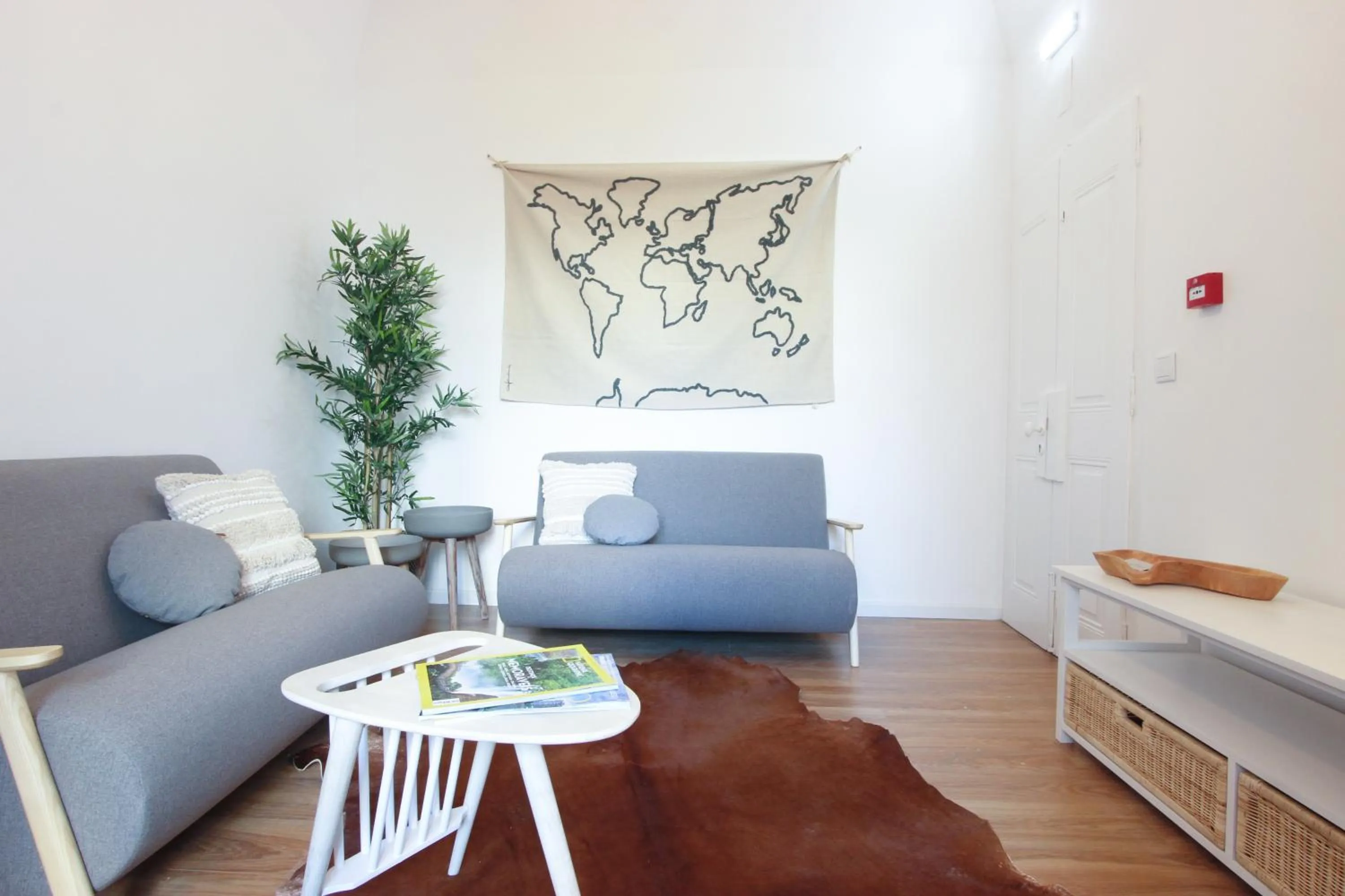 Communal lounge/ TV room in Lavradores Boutique Guesthouse