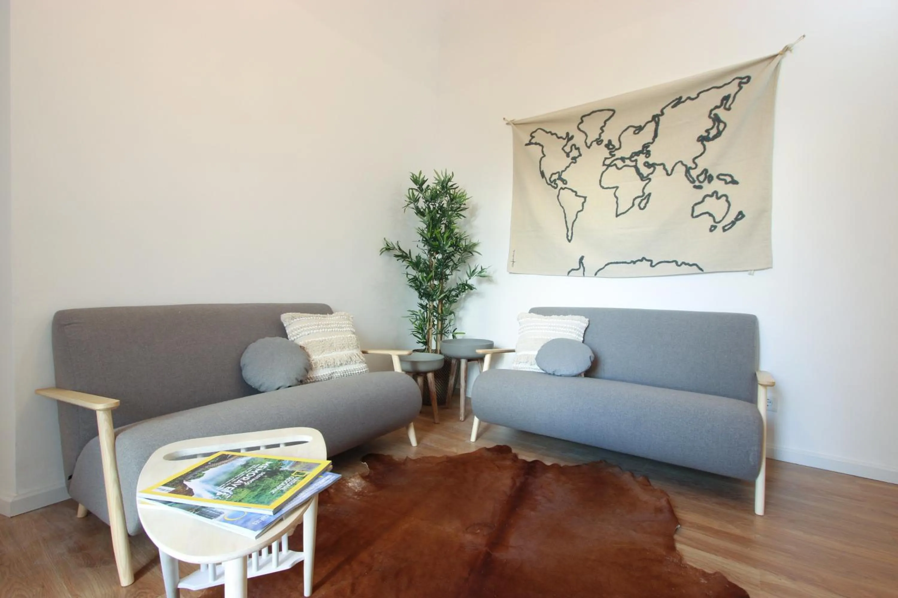 Communal lounge/ TV room in Lavradores Boutique Guesthouse