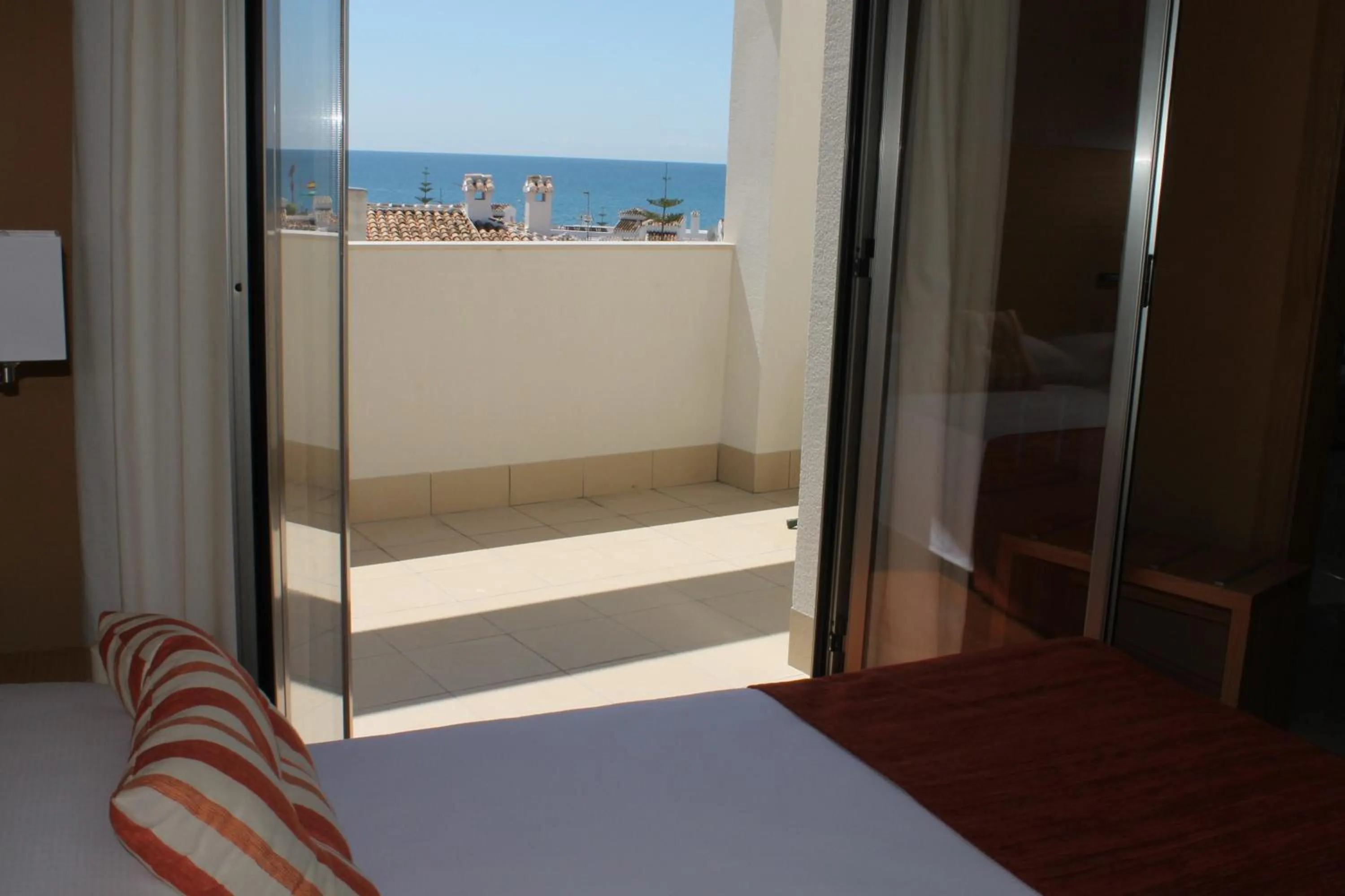 Balcony/Terrace, Bed in Hotel Carmen