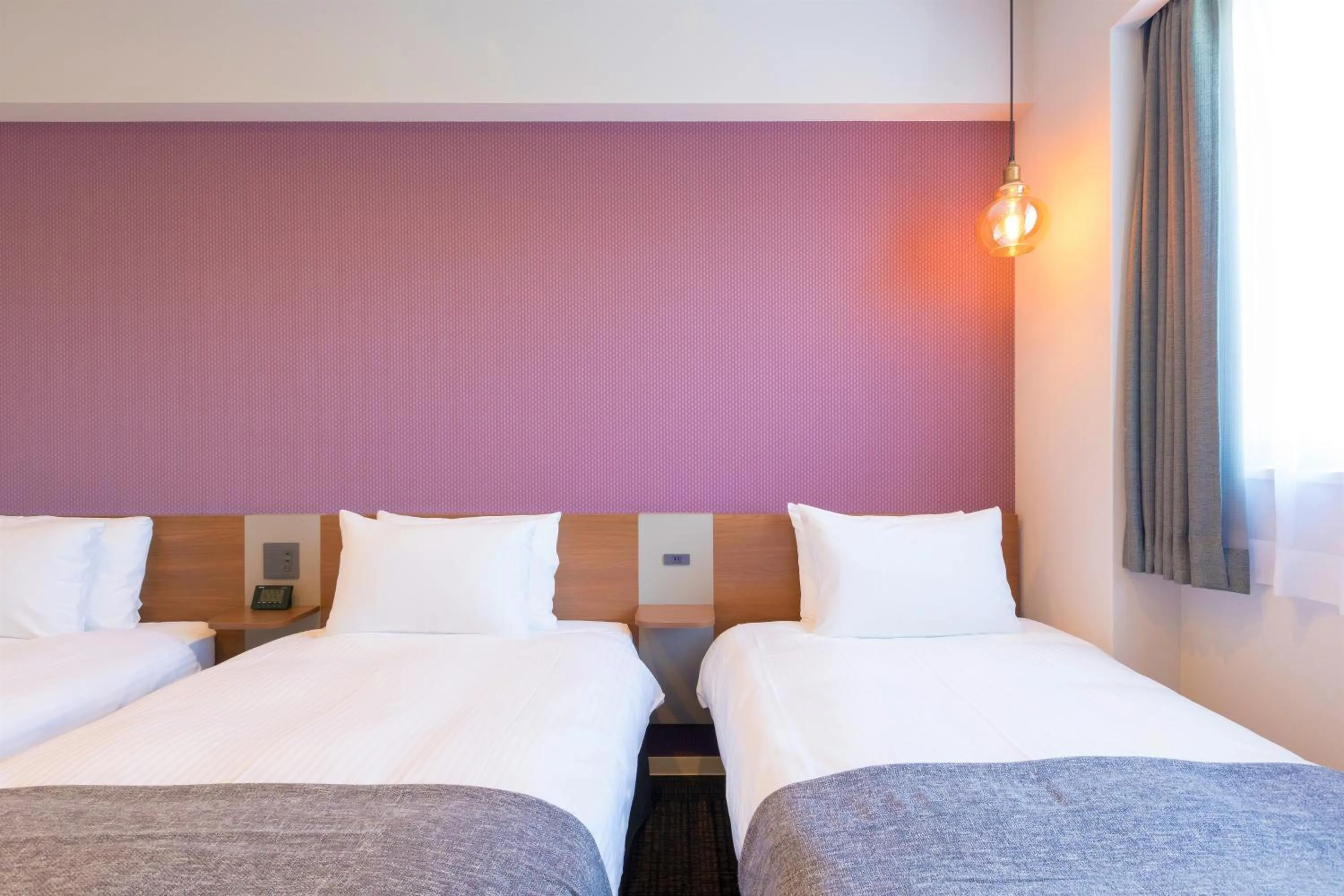 Bed in M's Hotel Kyoto Station Taruya