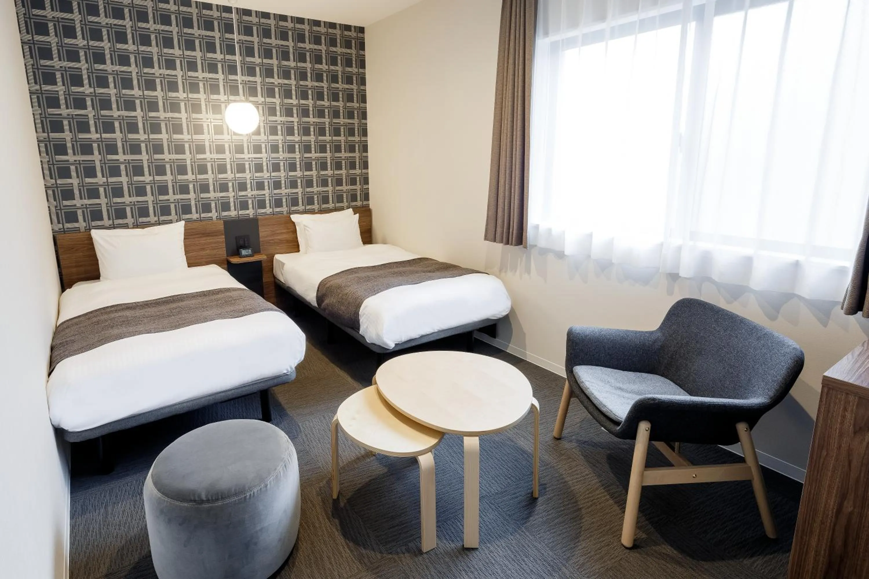 Bed in M's Hotel Kyoto Station Kizuya