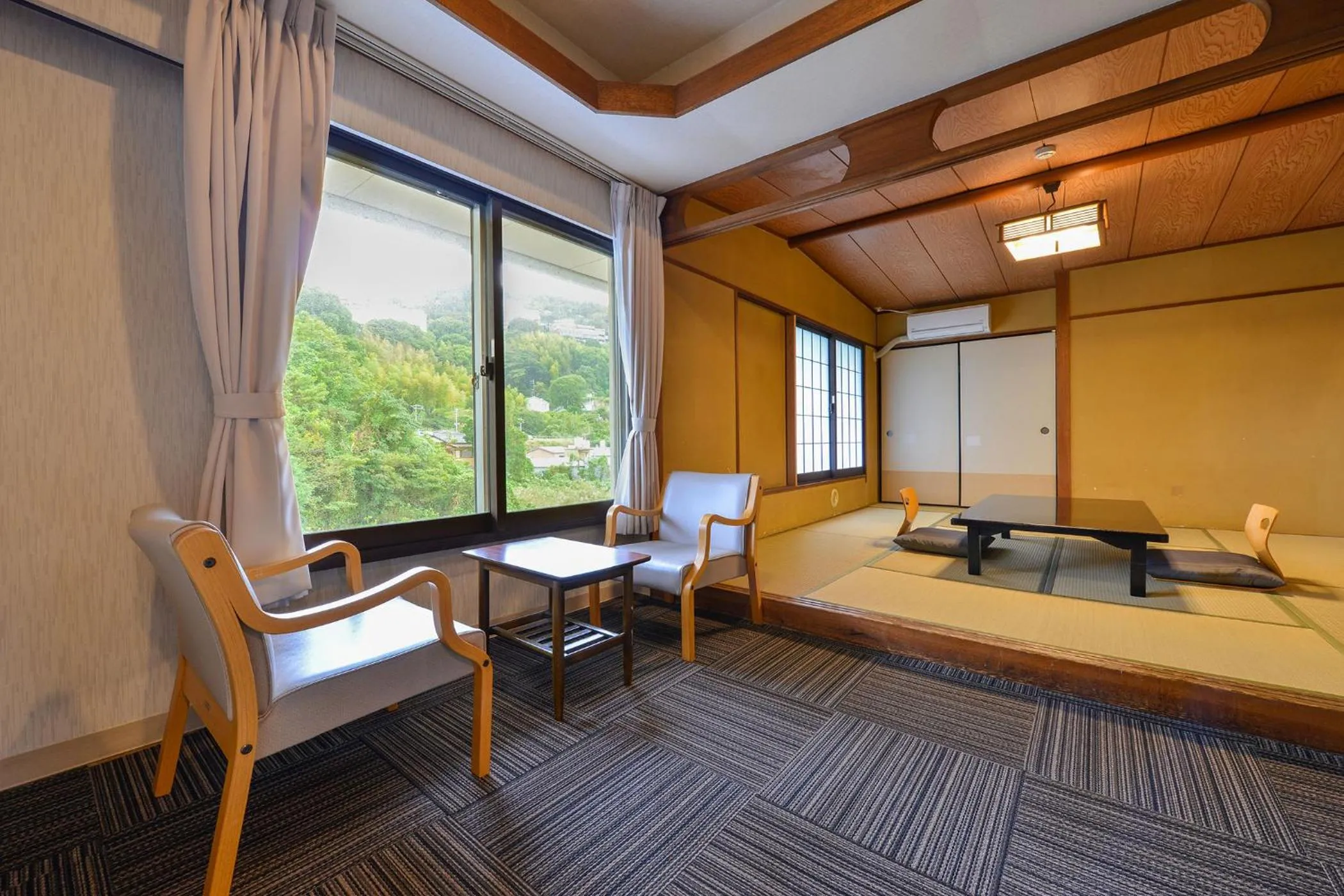 Living room, Bed in Ooedo Onsen Monogatari Hotel Suiyotei
