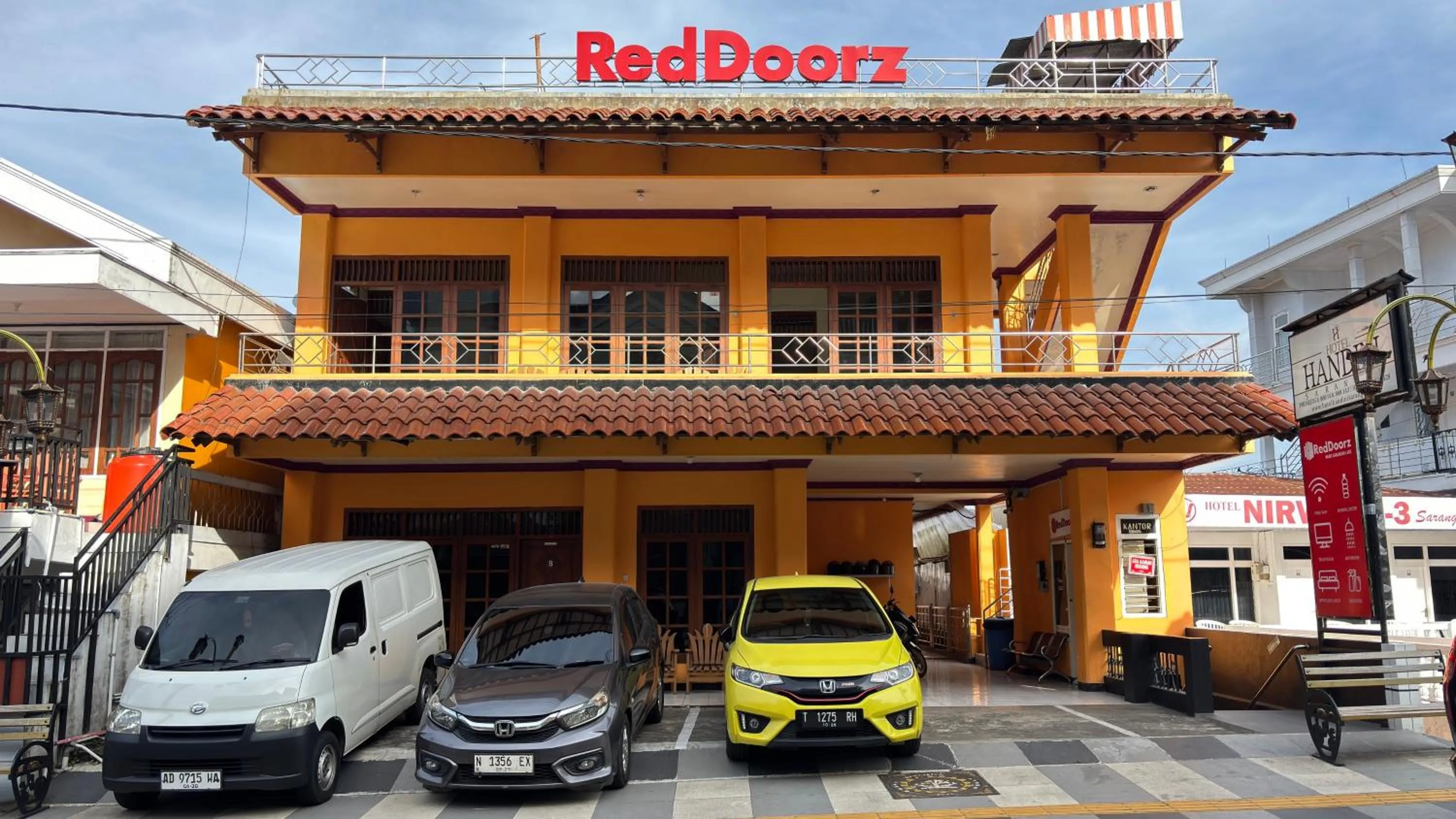 Facade/entrance in RedDoorz near Sarangan Lake
