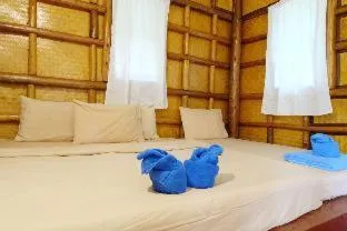 Bed in Koh kood Neverland beach resort