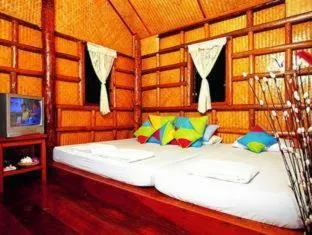 Bed in Koh kood Neverland beach resort
