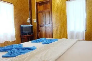 Bed in Koh kood Neverland beach resort