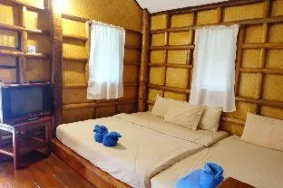 Bed in Koh kood Neverland beach resort