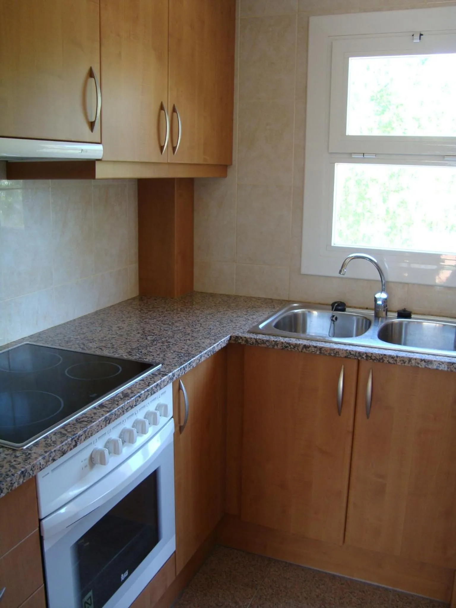 Kitchen or kitchenette in Payet Apartments