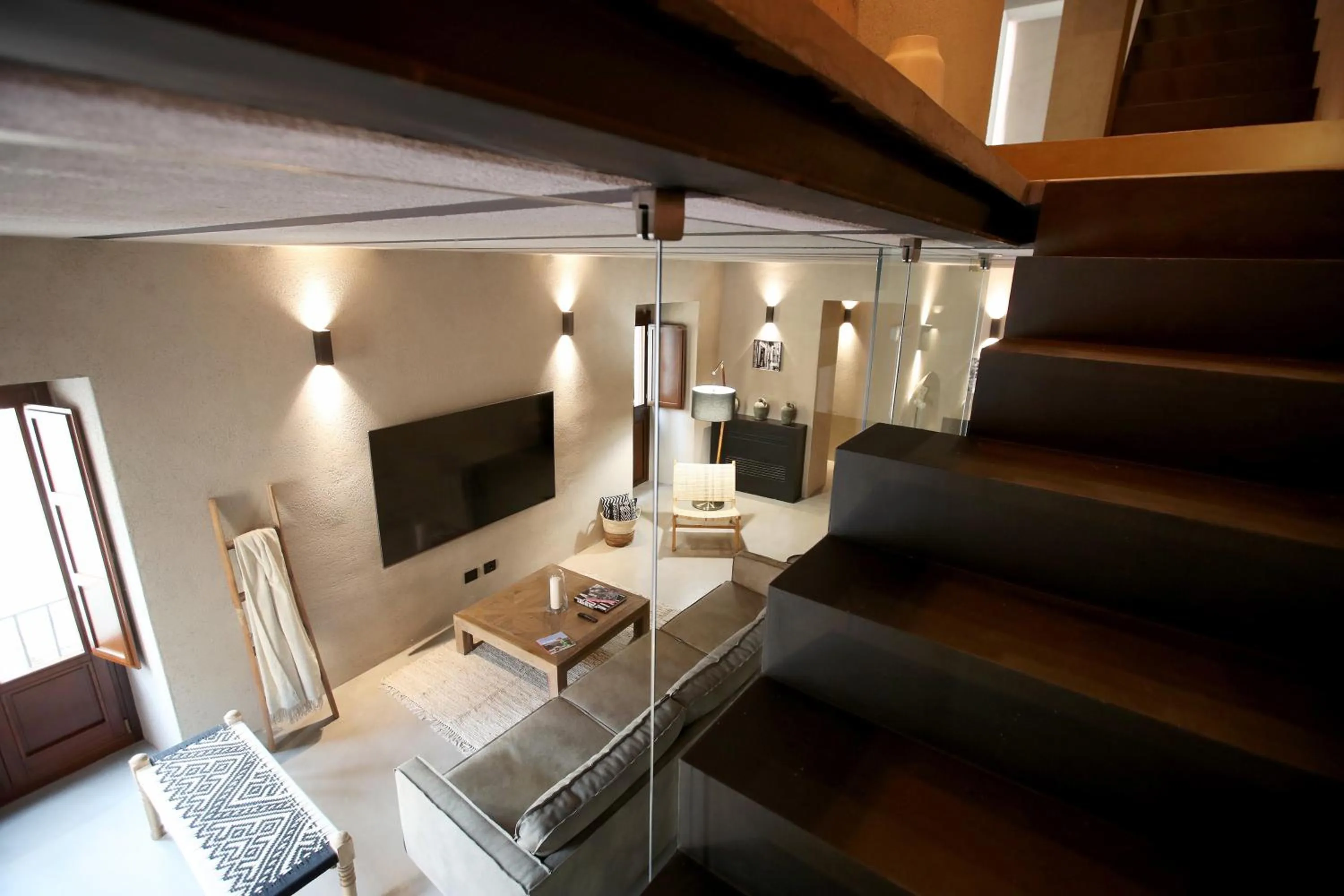 Communal lounge/ TV room in Casa Nostra Boutique Hotel & Spa