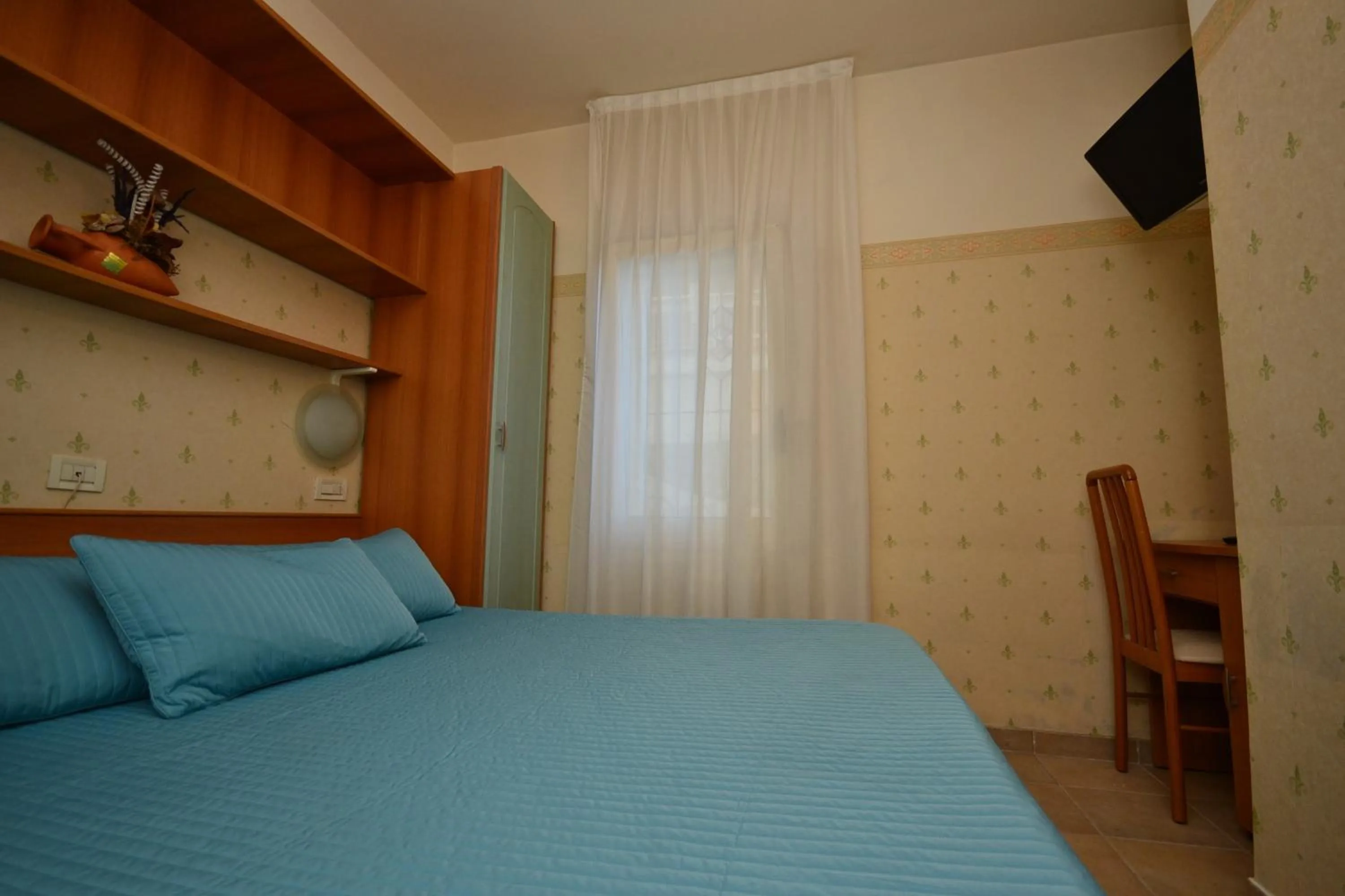 Bed in Hotel San Francisco Spiaggia