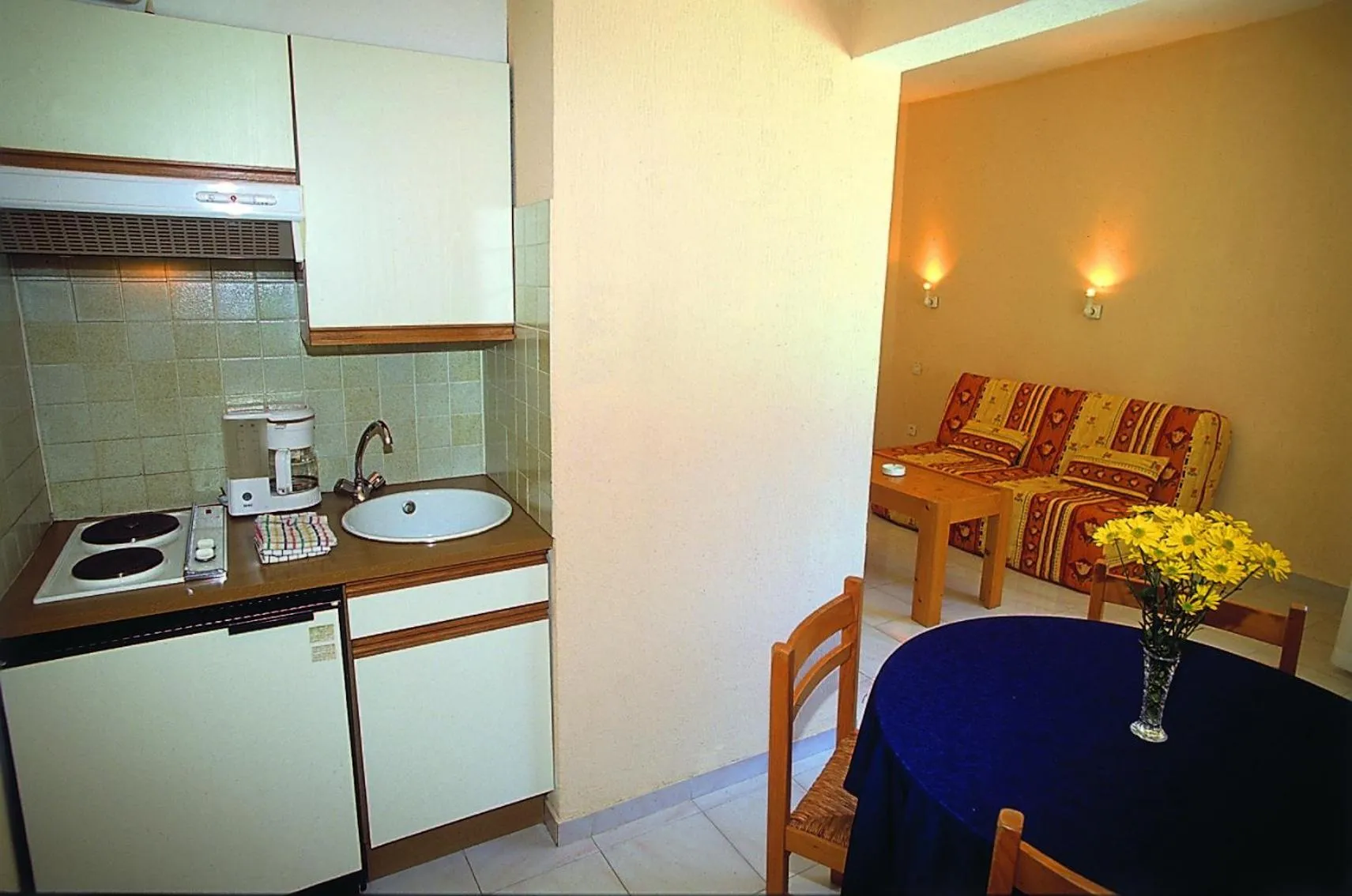 Kitchen or kitchenette in Hôtel Lou Paouvadou