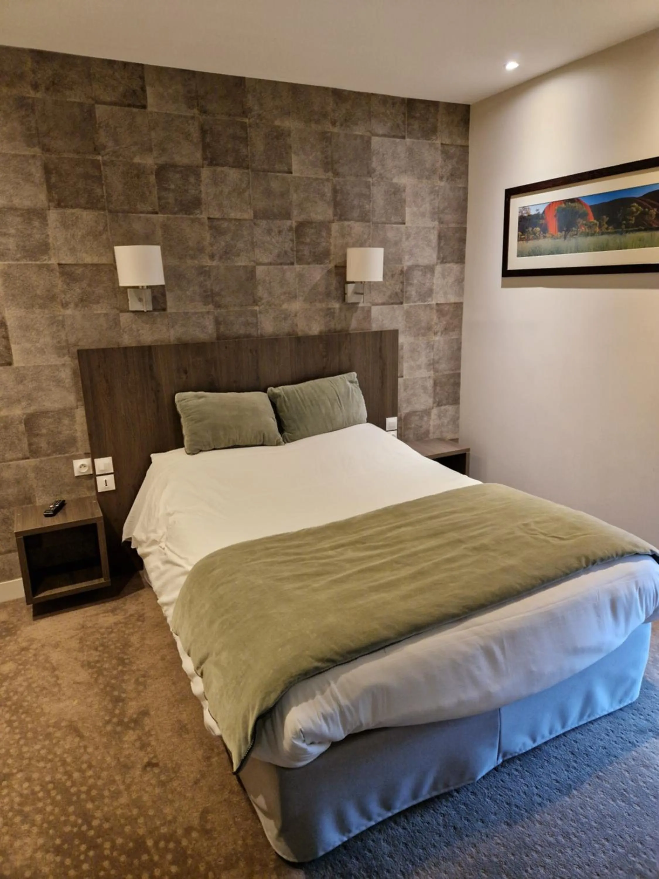 Bed in Hotel Acadie Les Ulis