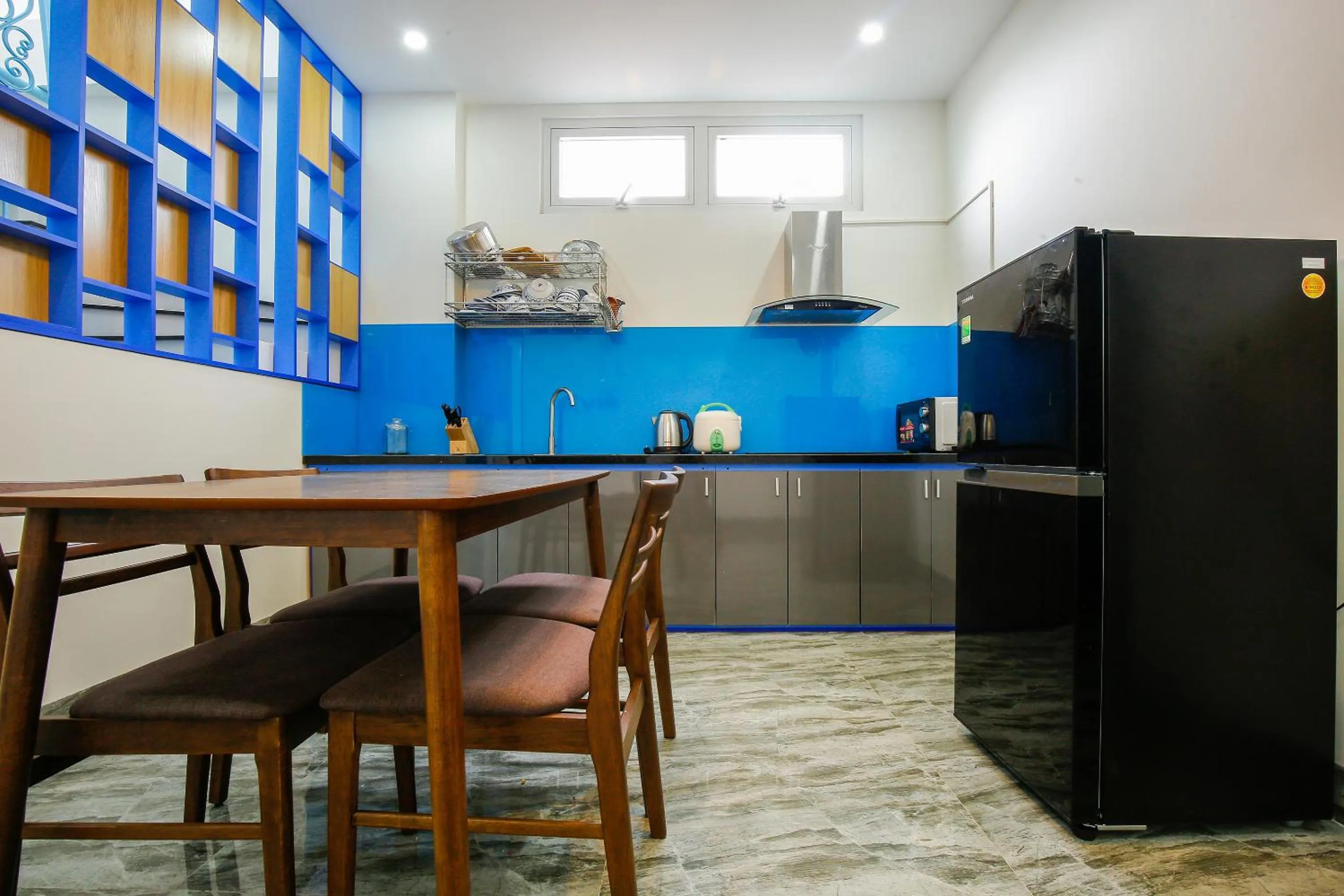 Dining area in Santorini House and Coffee