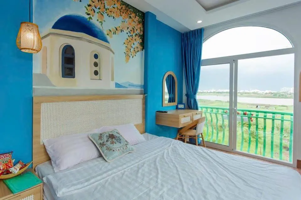 Bed in Santorini House and Coffee