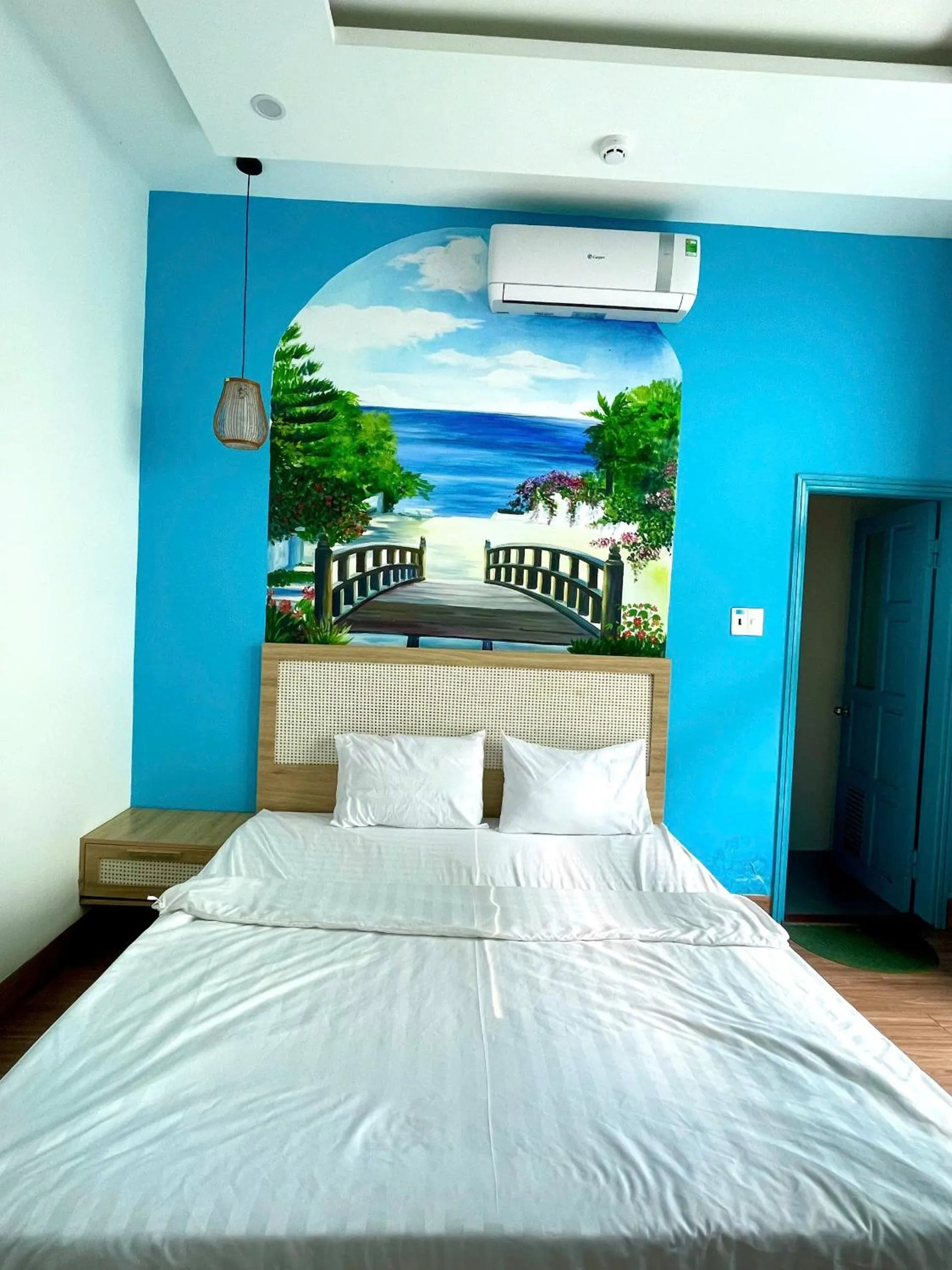 Bed in Santorini House and Coffee