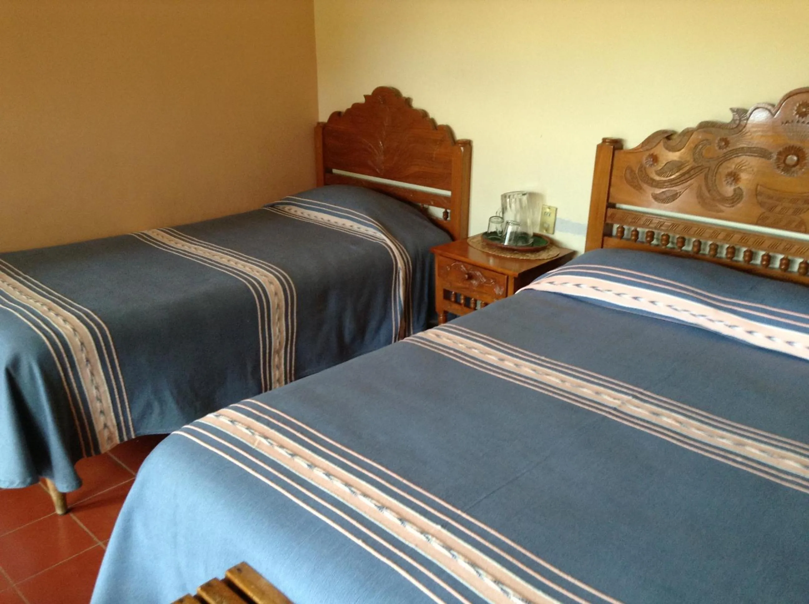 Bed in Posada de la Salud