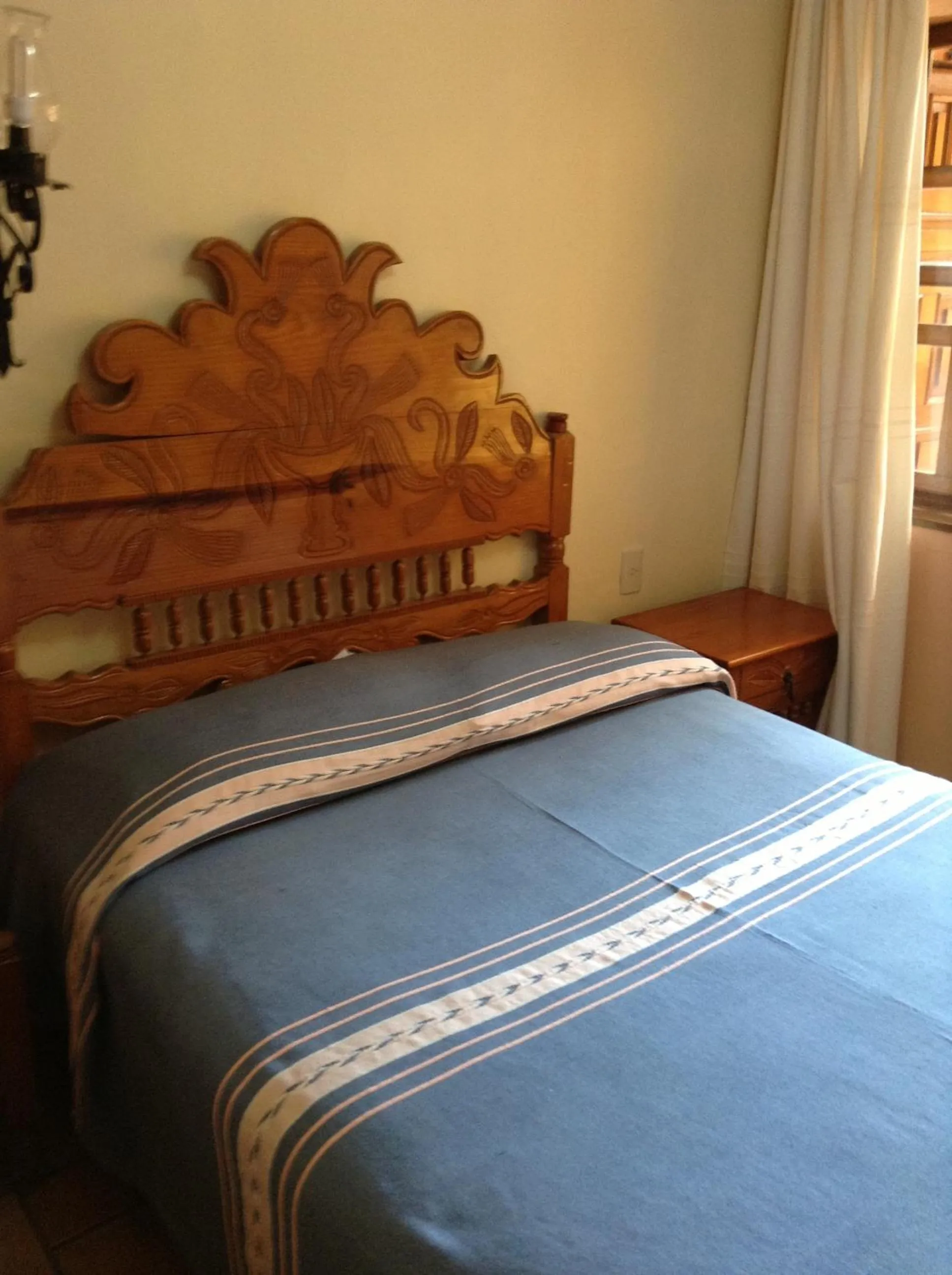 Bed in Posada de la Salud