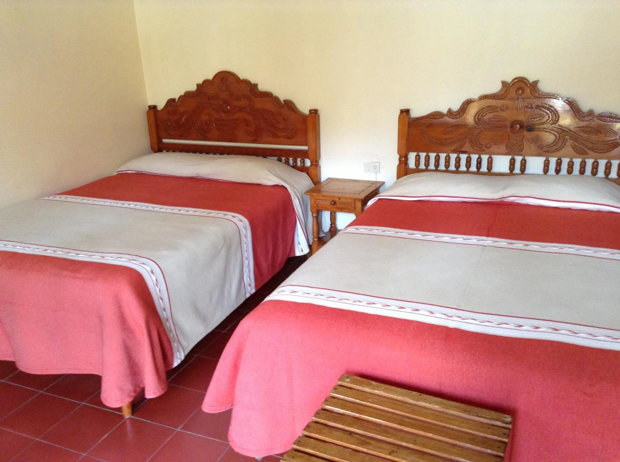 Bed in Posada de la Salud