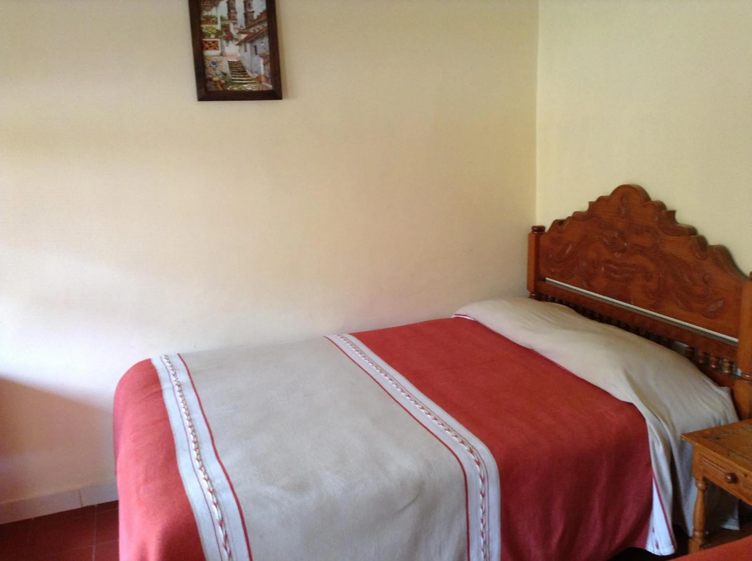 Bed in Posada de la Salud