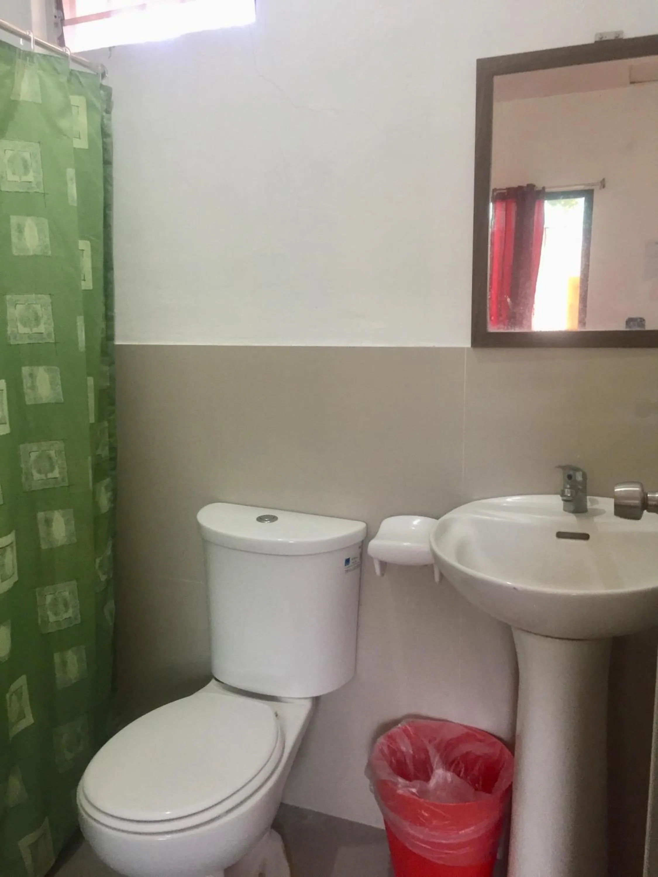 Toilet in Paguia’s Cottages