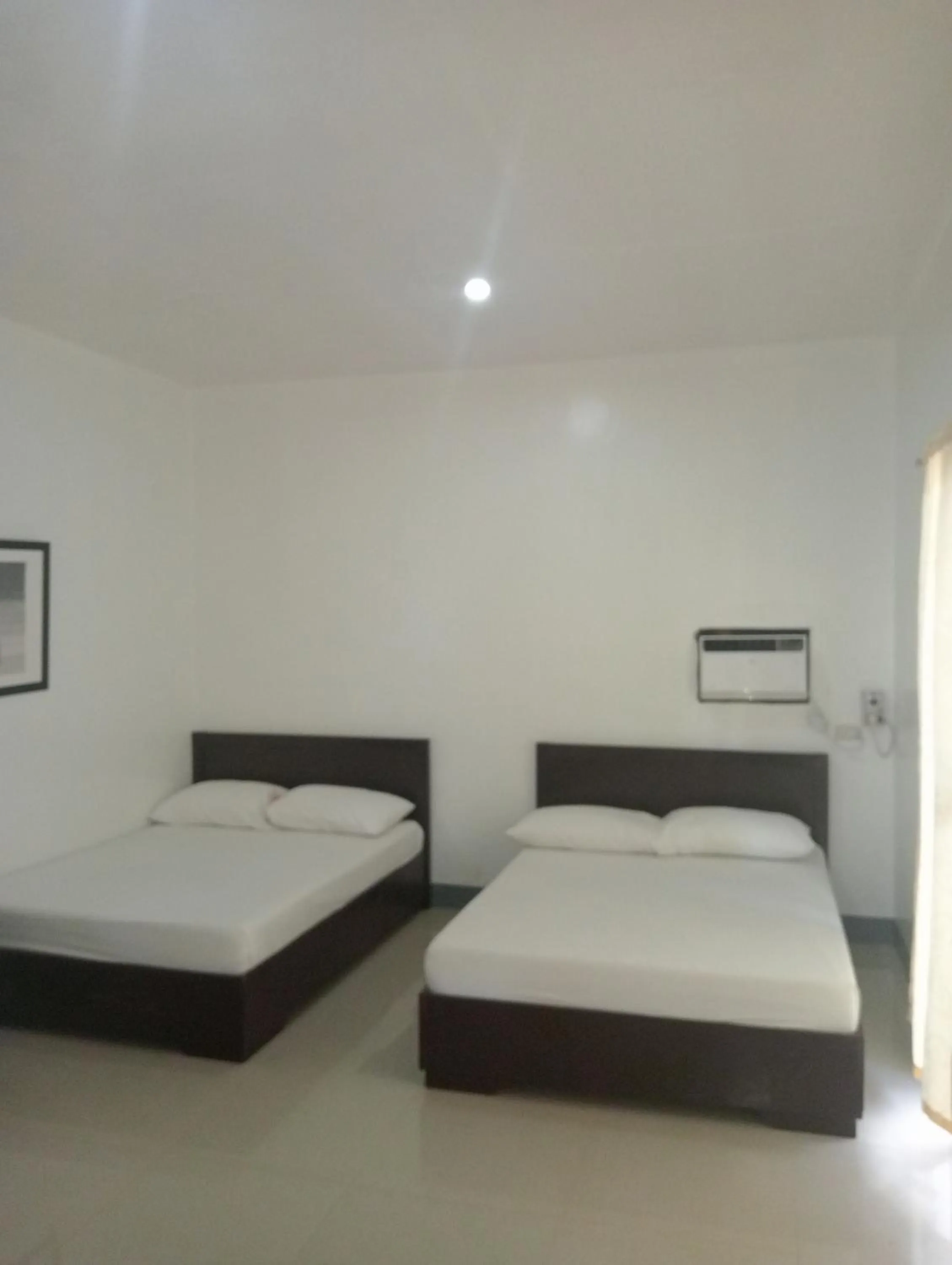 Bed in Paguia’s Cottages