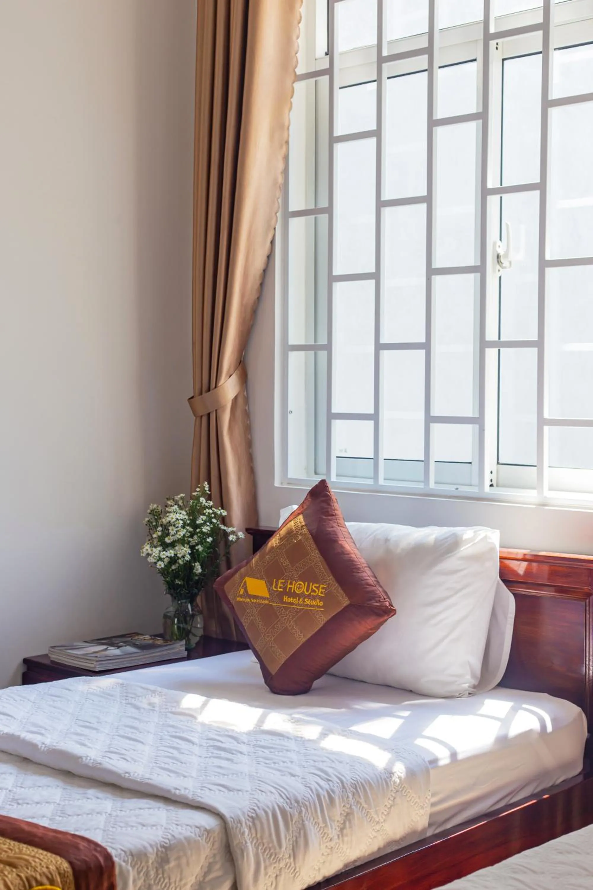 Bed in Le House Hotel and Studio