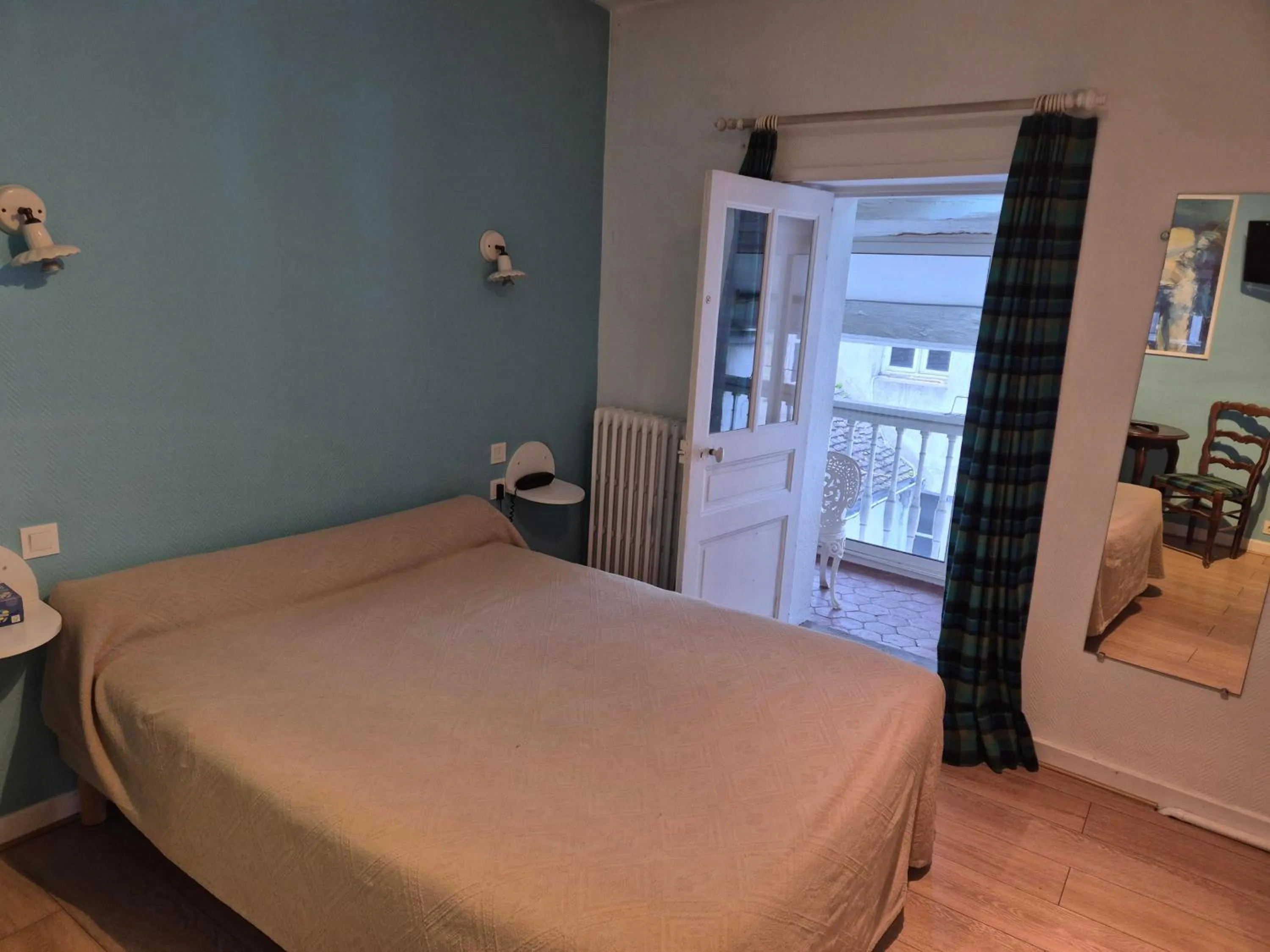 Bed in Hotel Saint Jean