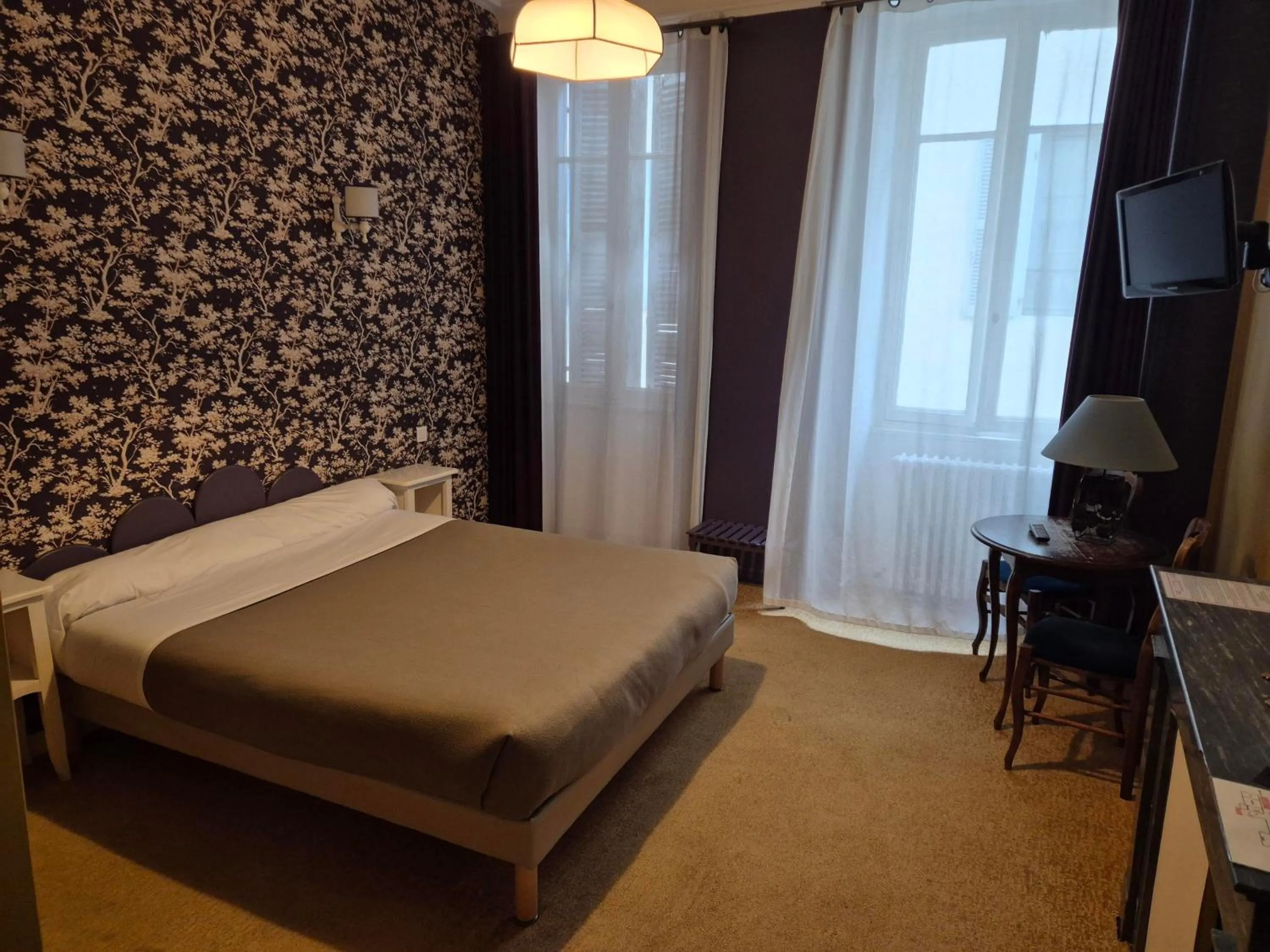 Bed in Hotel Saint Jean