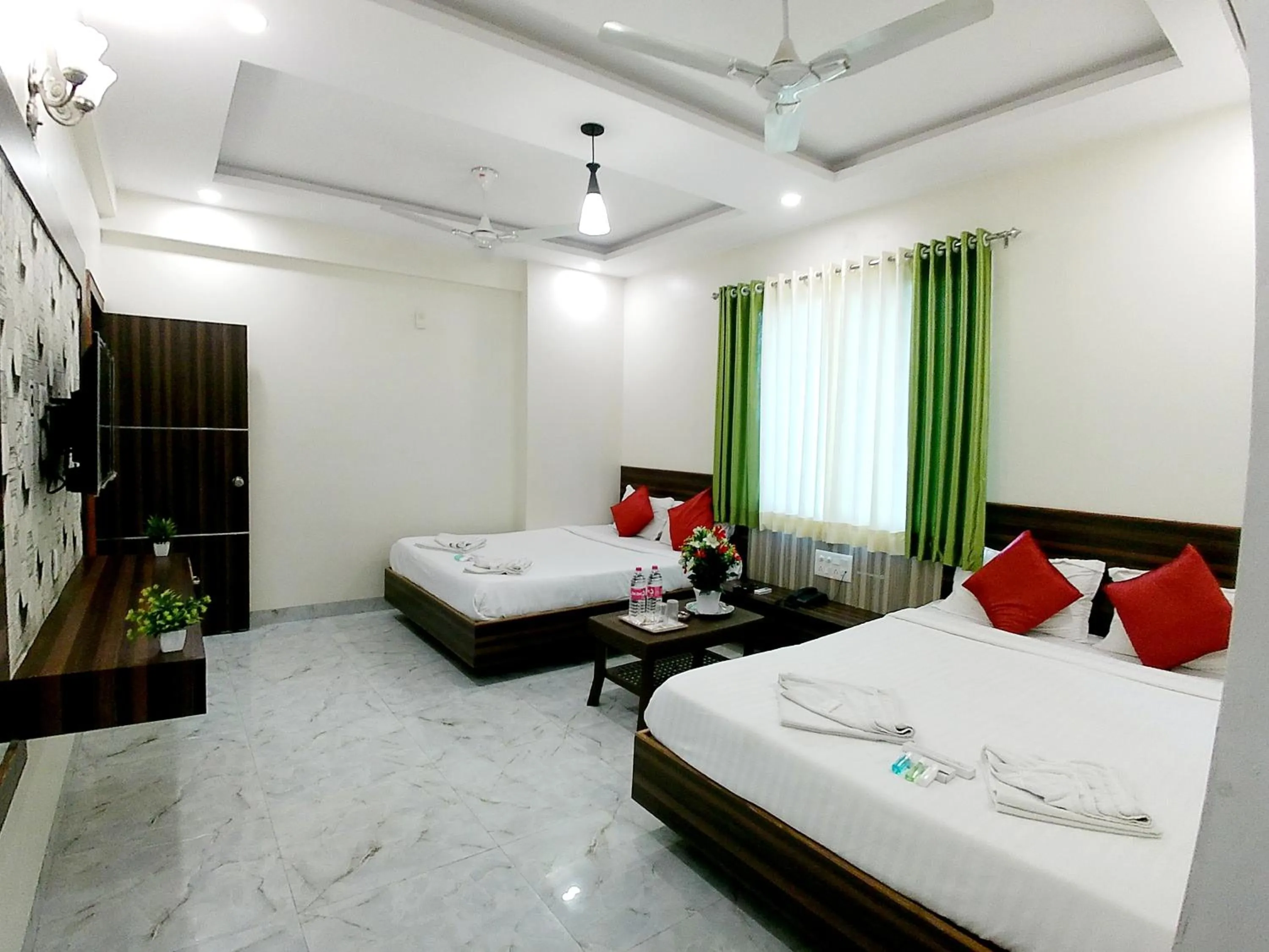 Bed in Hotel Sai SK Palace