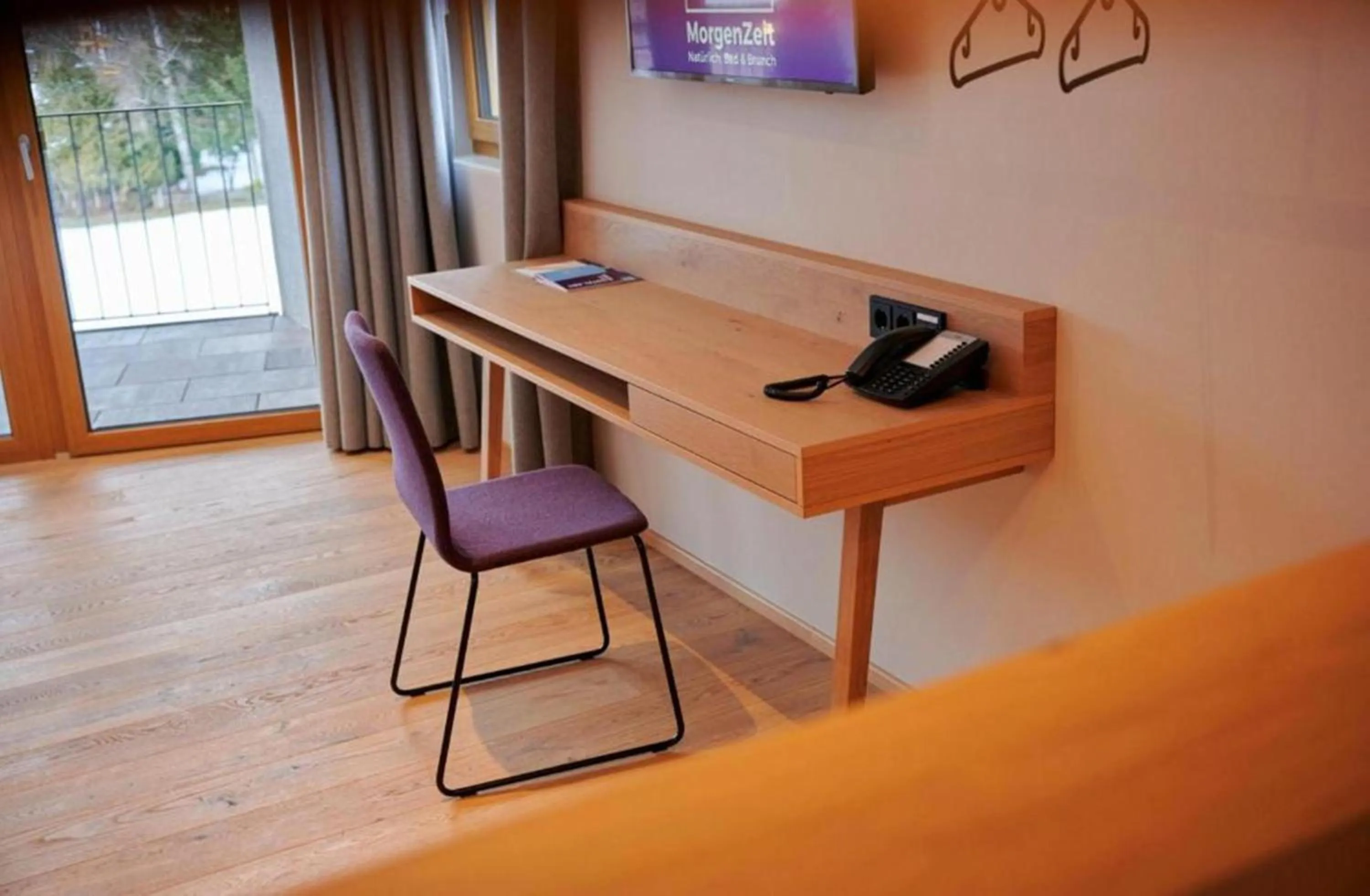 Photo of the whole room in Wellness und Brunch Hotel MorgenZeit beheizter Naturteich Genuss Frühstück bis 13 Uhr Hochkönig Sommercard