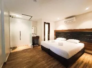 Bed in The Hub District Garden Suites