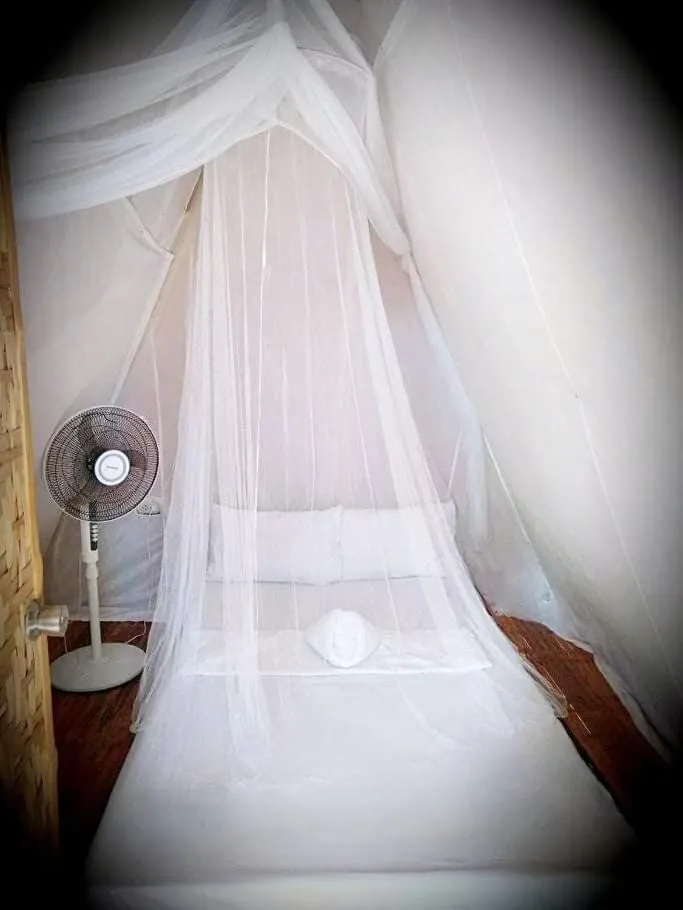 Bed in SHUKRAN Apartelle