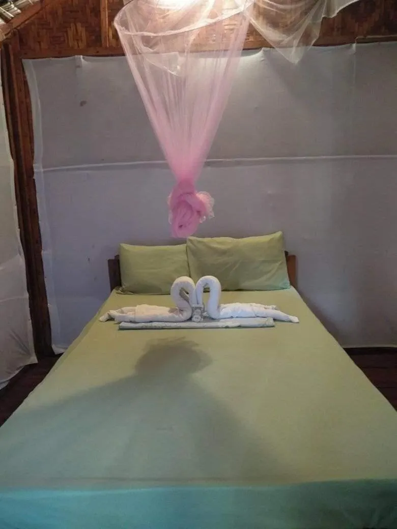 Bed in SHUKRAN Apartelle