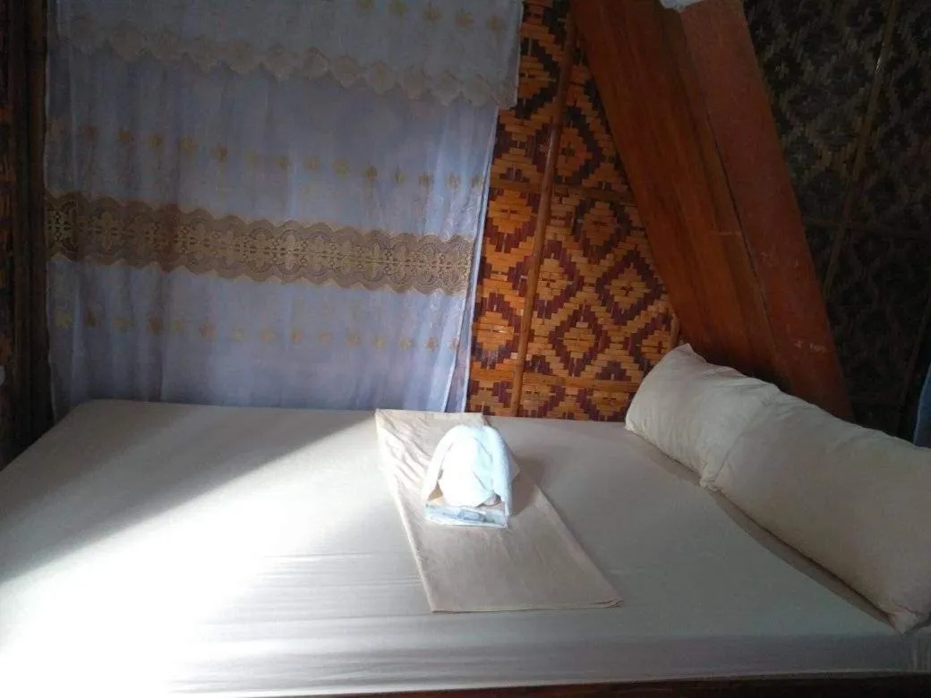 Bed in SHUKRAN Apartelle