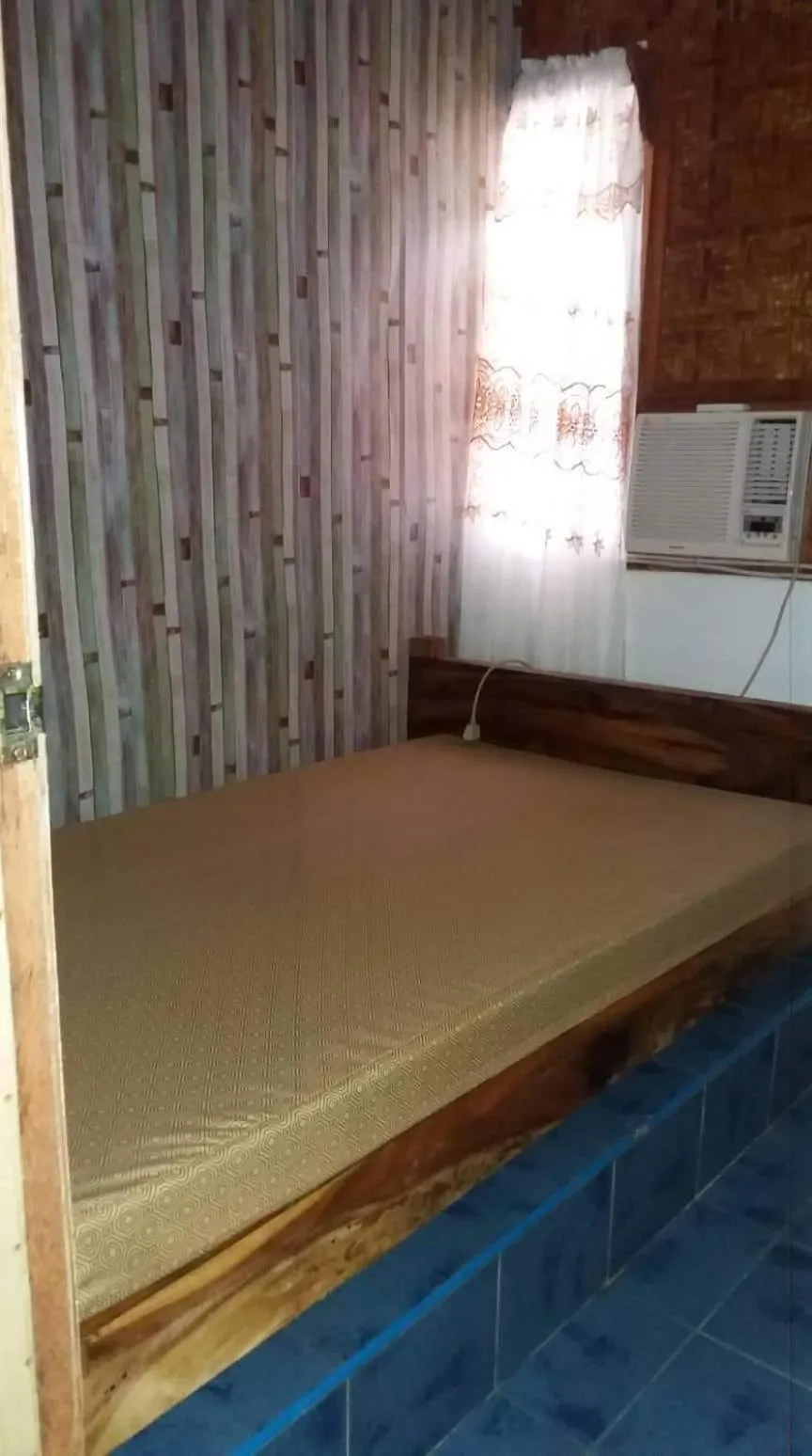 Bed in SHUKRAN Apartelle