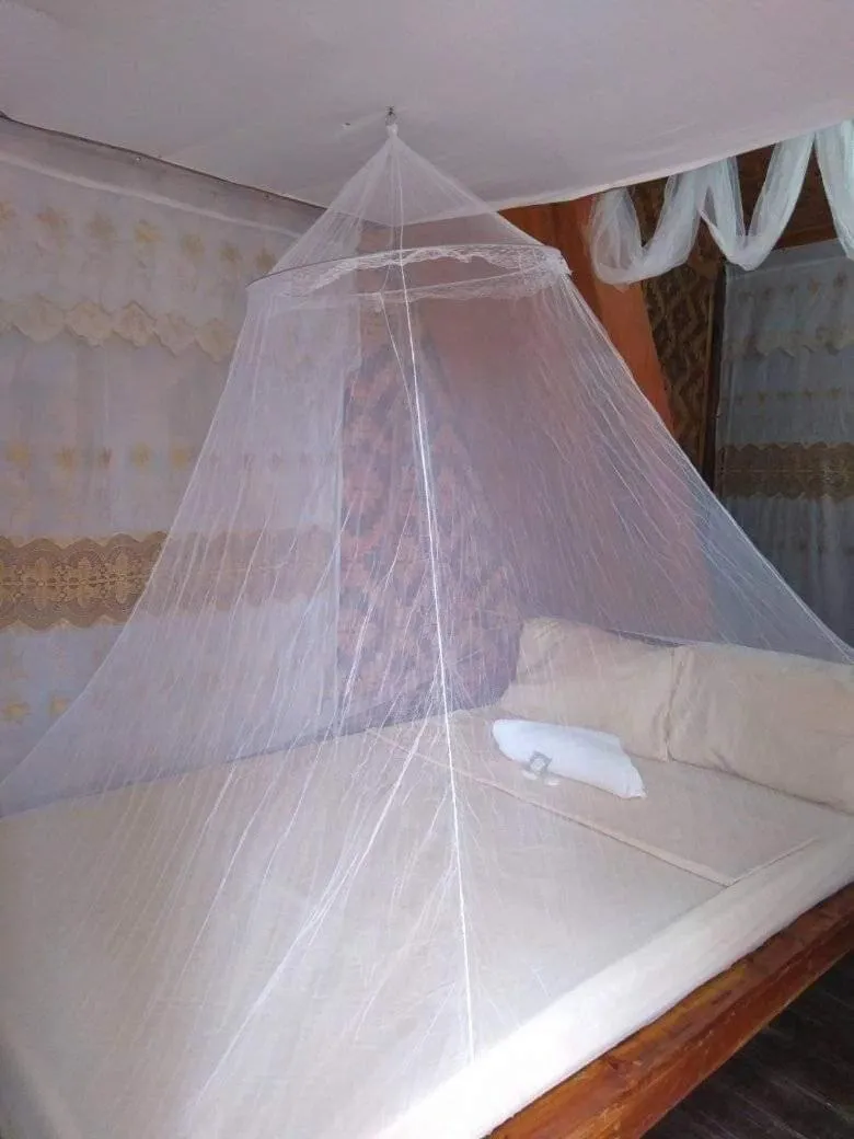 Bed in SHUKRAN Apartelle