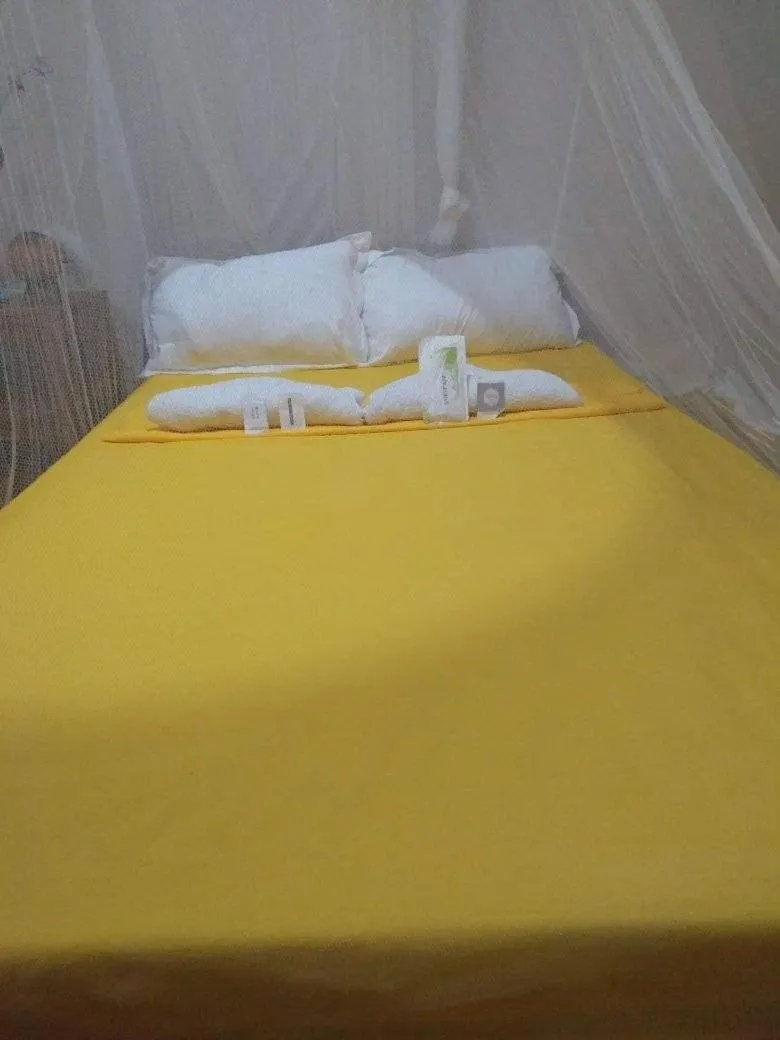 Bed in SHUKRAN Apartelle