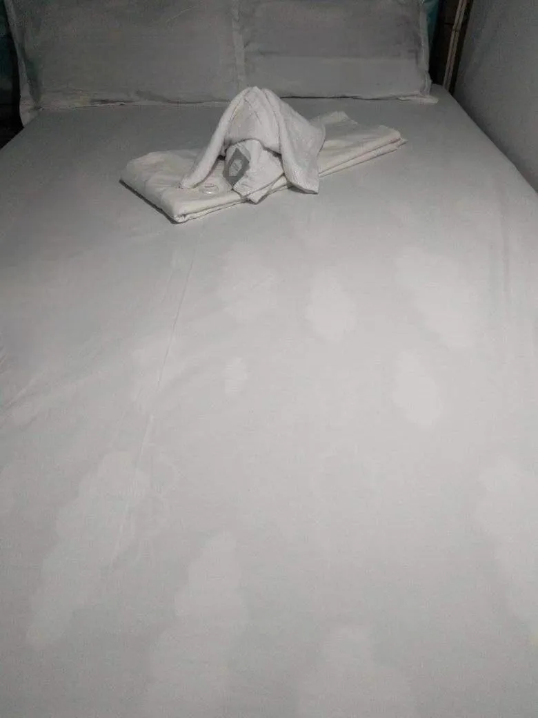 Bed in SHUKRAN Apartelle