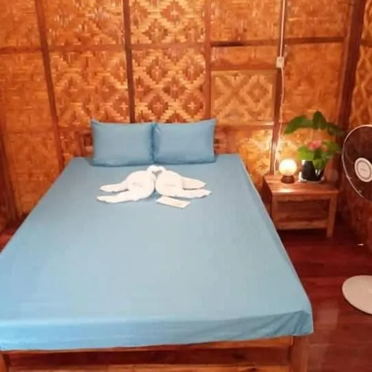 Bed in SHUKRAN Apartelle