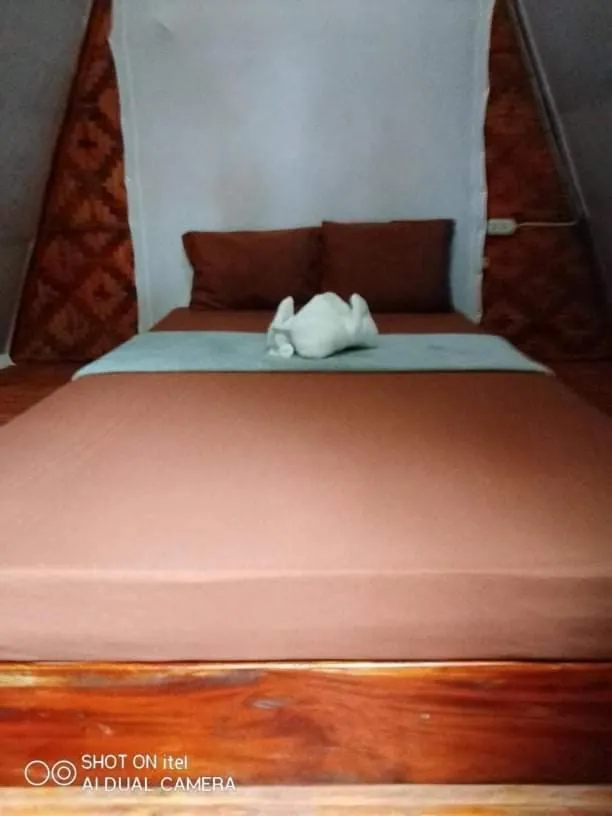 Bed in SHUKRAN Apartelle