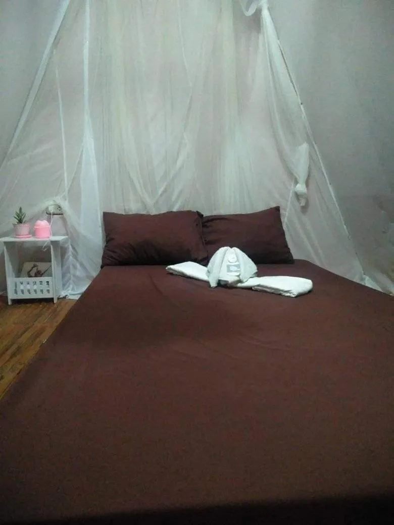 Bed in SHUKRAN Apartelle