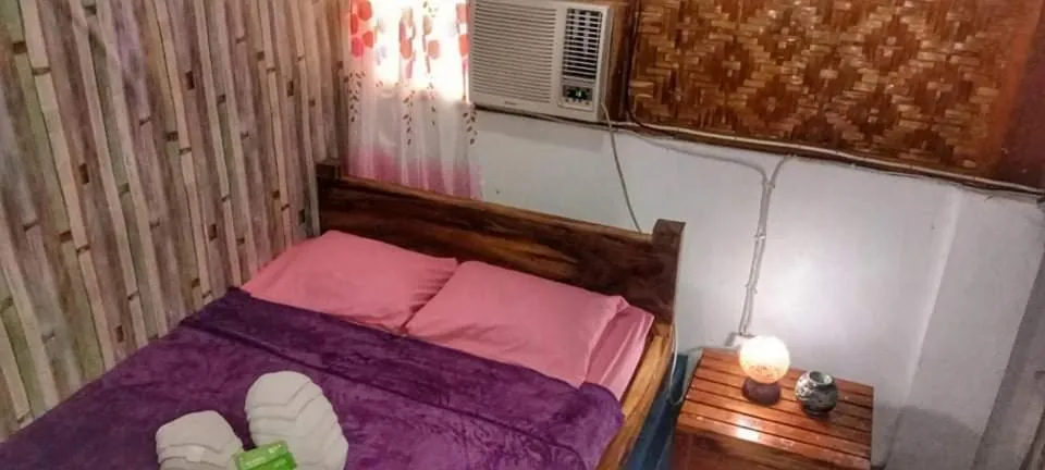 Bed in SHUKRAN Apartelle