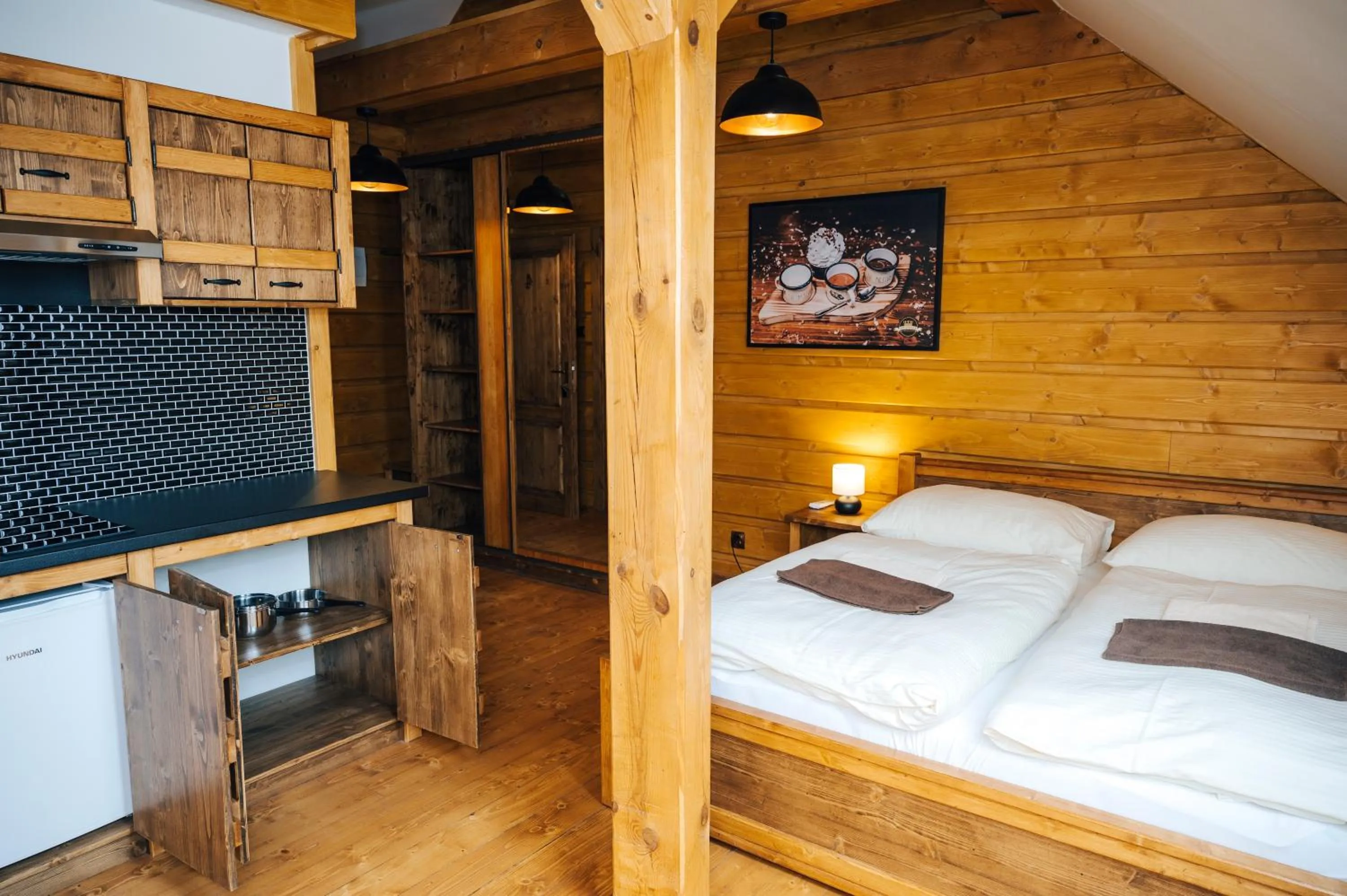 Bed in Nestville Apartments