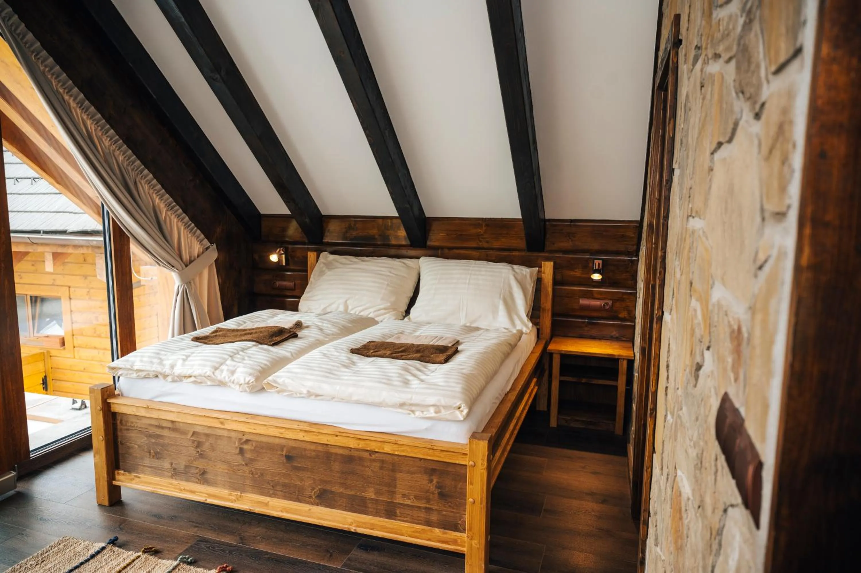 Bed in Nestville Apartments