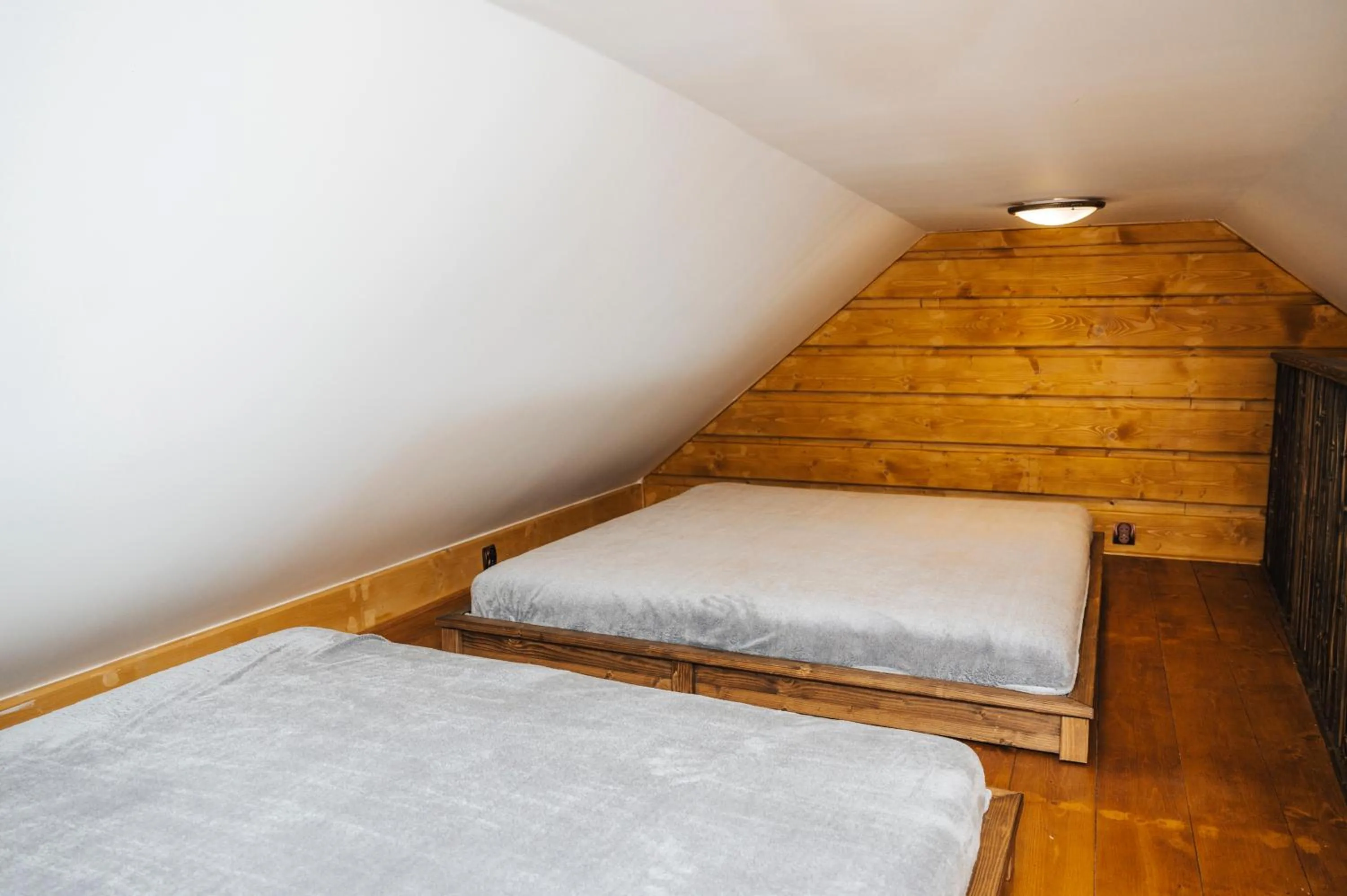 Bed in Nestville Apartments