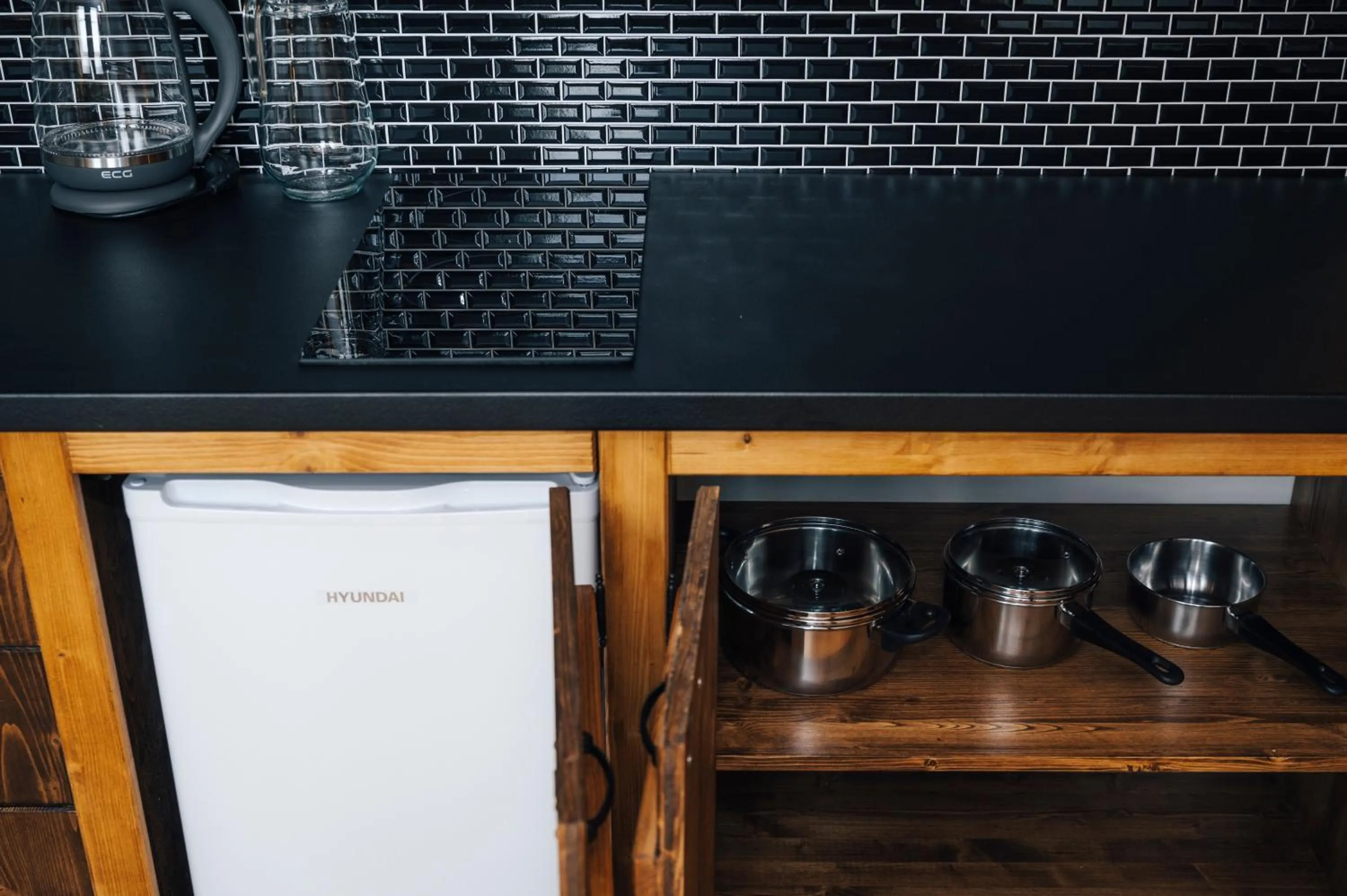 Kitchen or kitchenette in Nestville Apartments