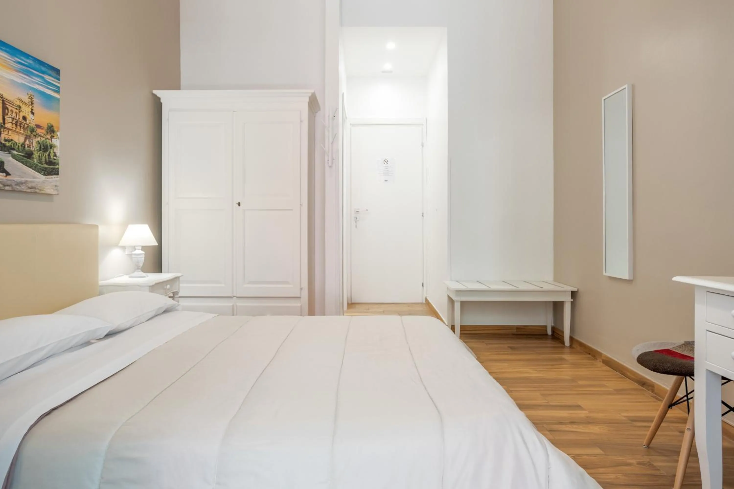 Bed in B&B Palermo Bella Rooms and Suites