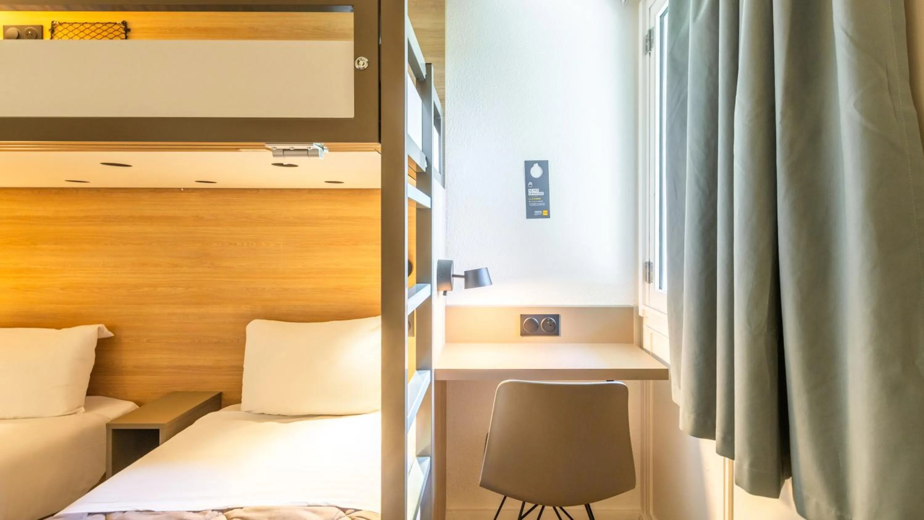 Bed in Premiere Classe Versailles - Saint Cyr L'ecole