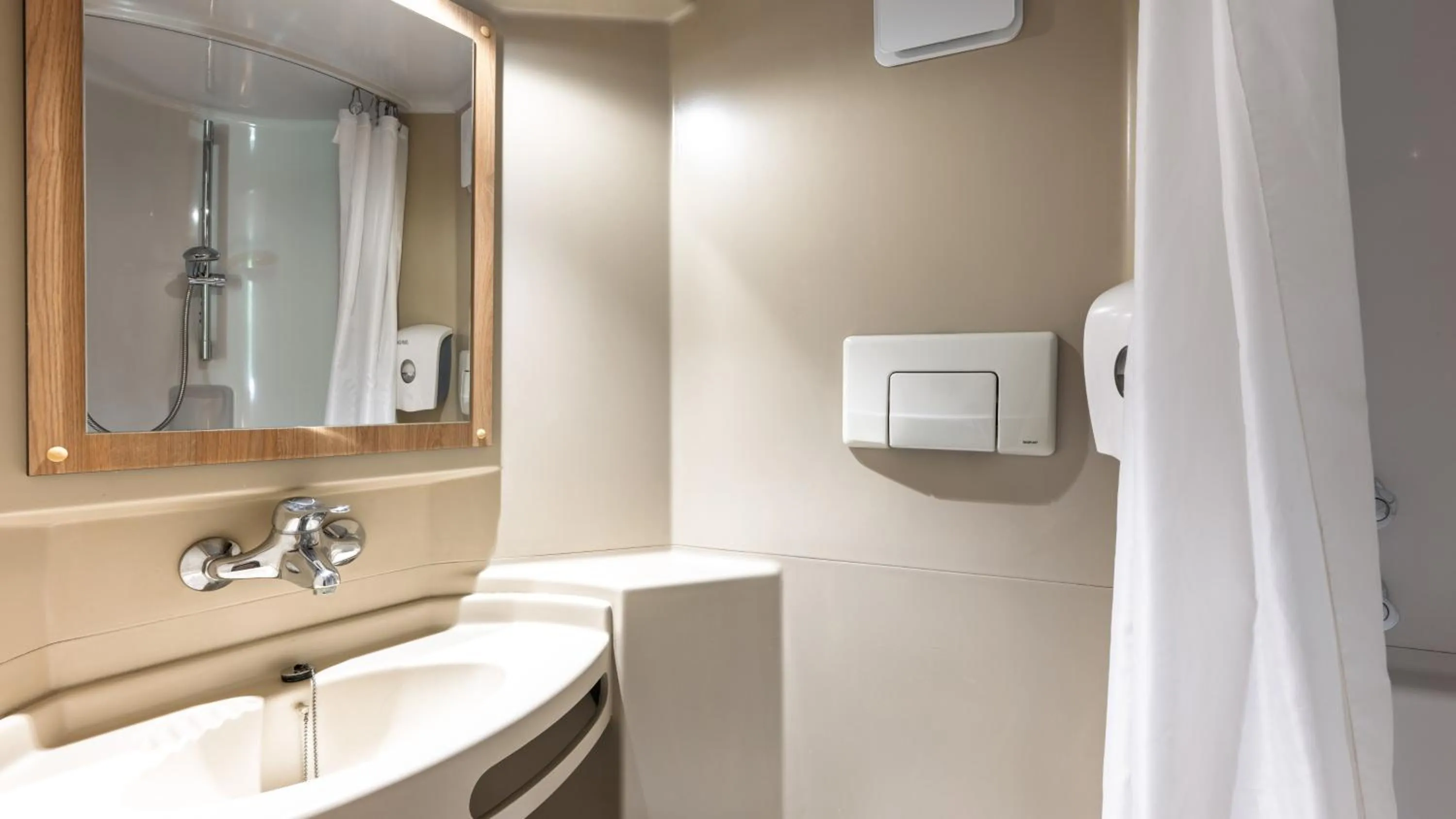 Bathroom in Premiere Classe Valenciennes Ouest Petite Foret